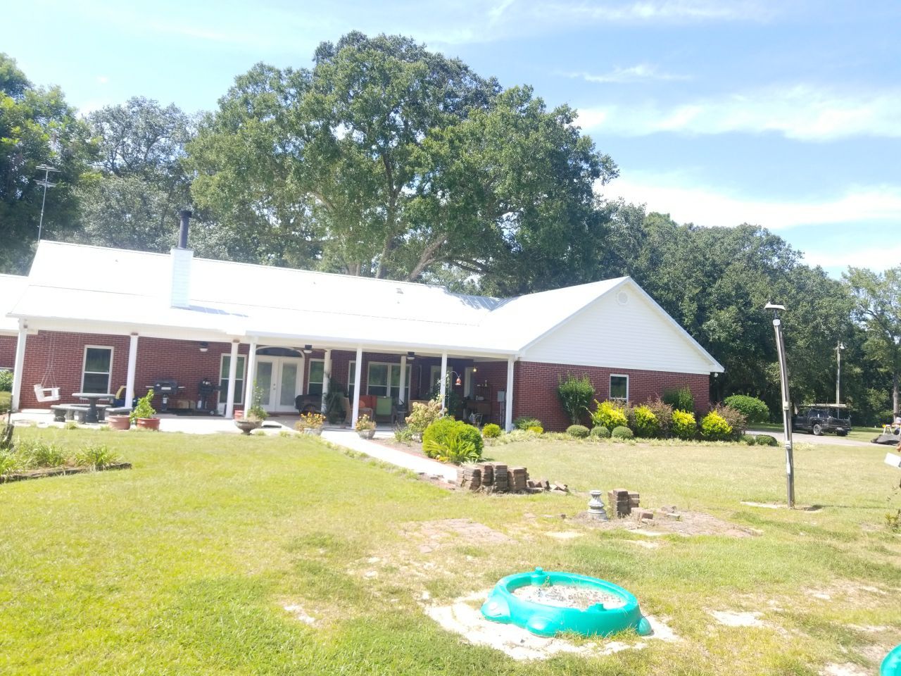 Residential Roofing Installation using Metal roofing by American Roofing & Construction LLC