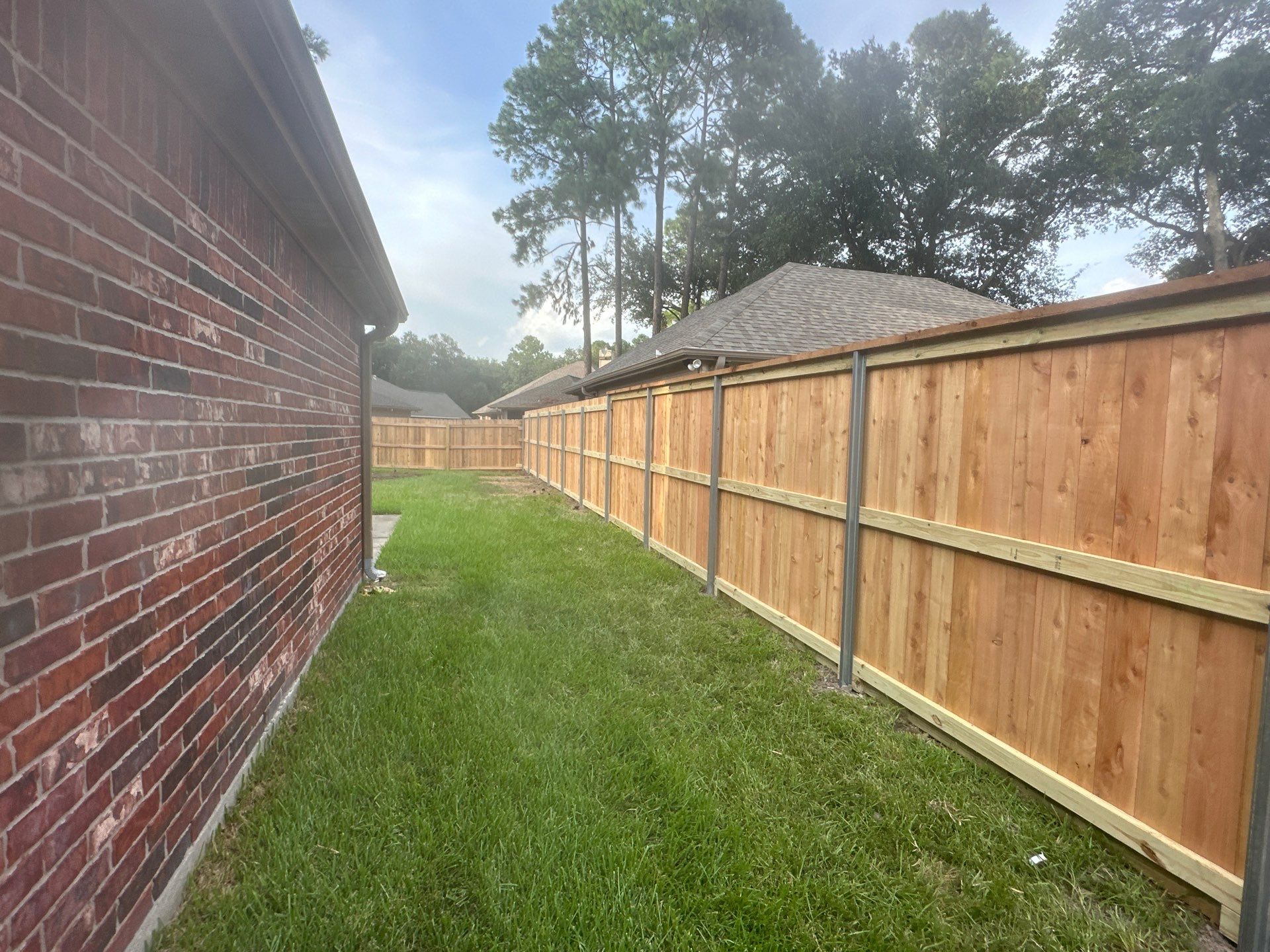 Wood fence project in Cypress by Tim's Fences