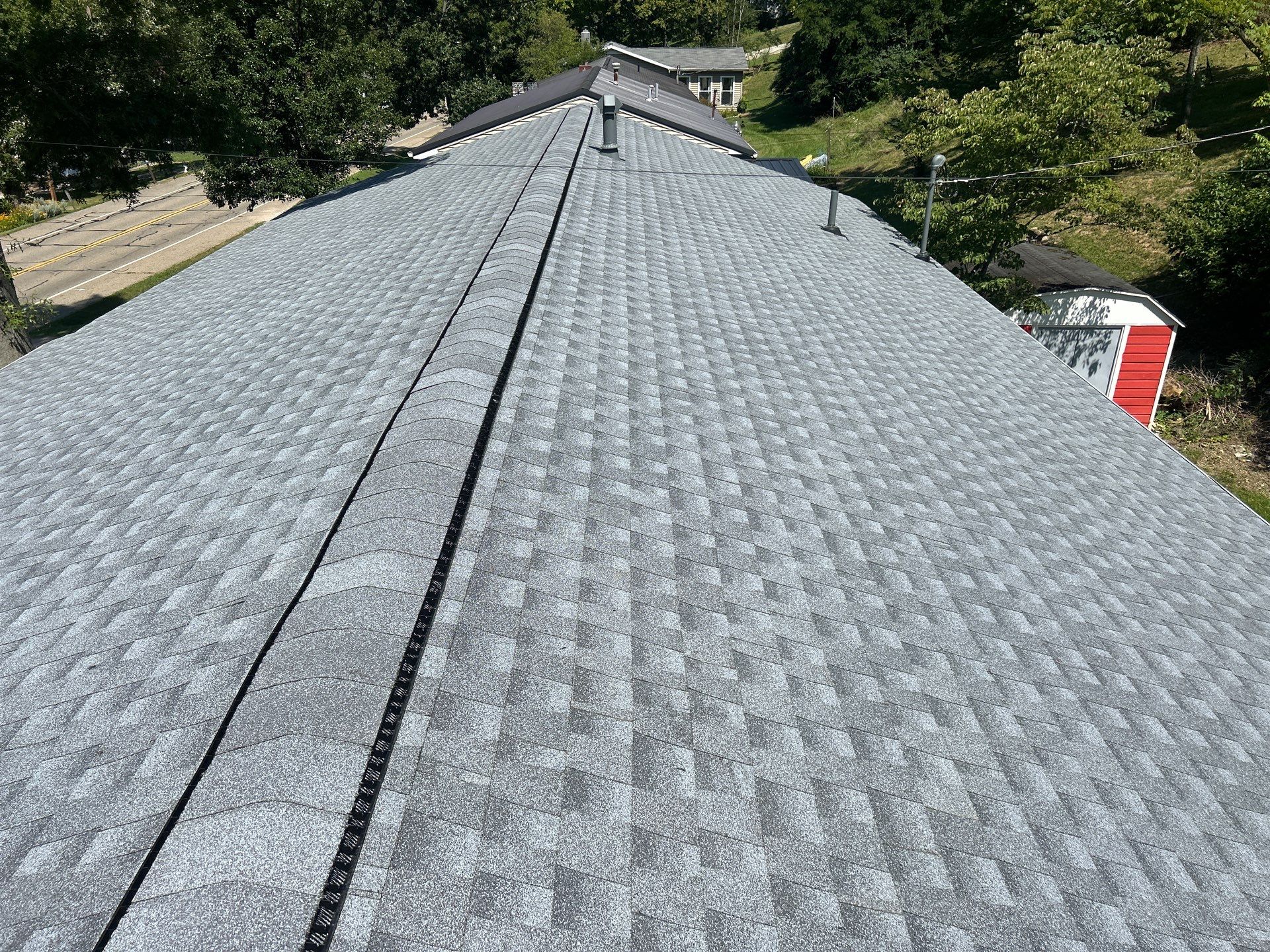 Residential Roofing Installation using GAF Timberline HDZ Oyster Grey by Rainstoppers Roofing