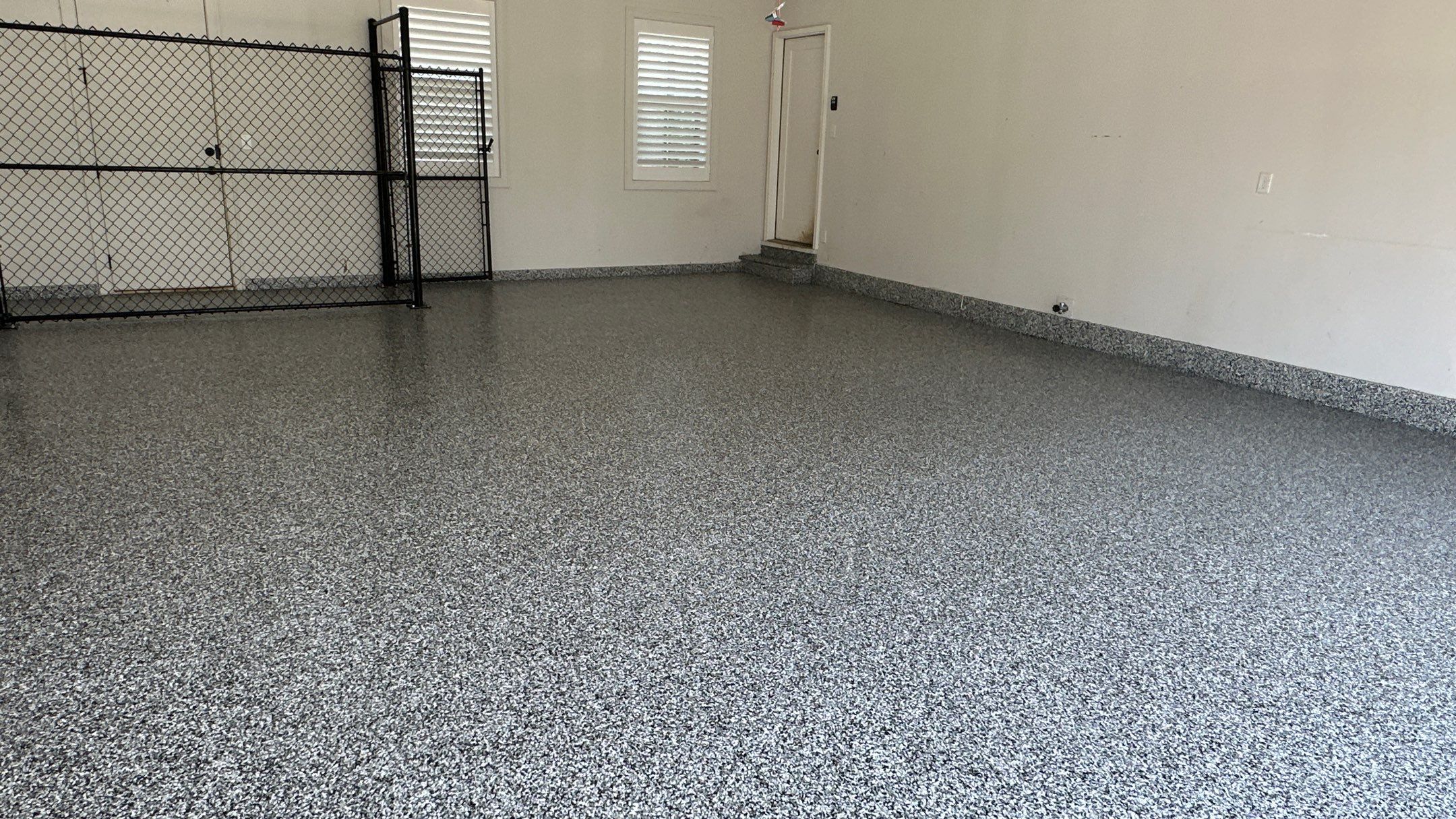 Jim E. went with a beautiful Banner Flake floor  by Banner Garage