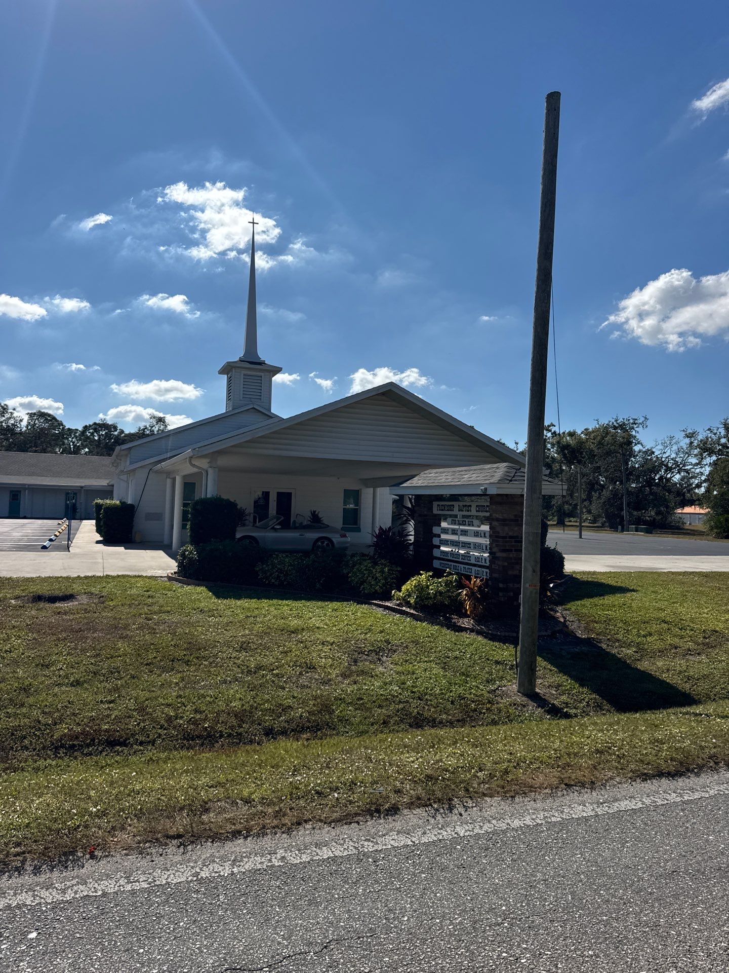 Downspout Installation using White Down Spouts in Sarasota FL by Gutter Professors