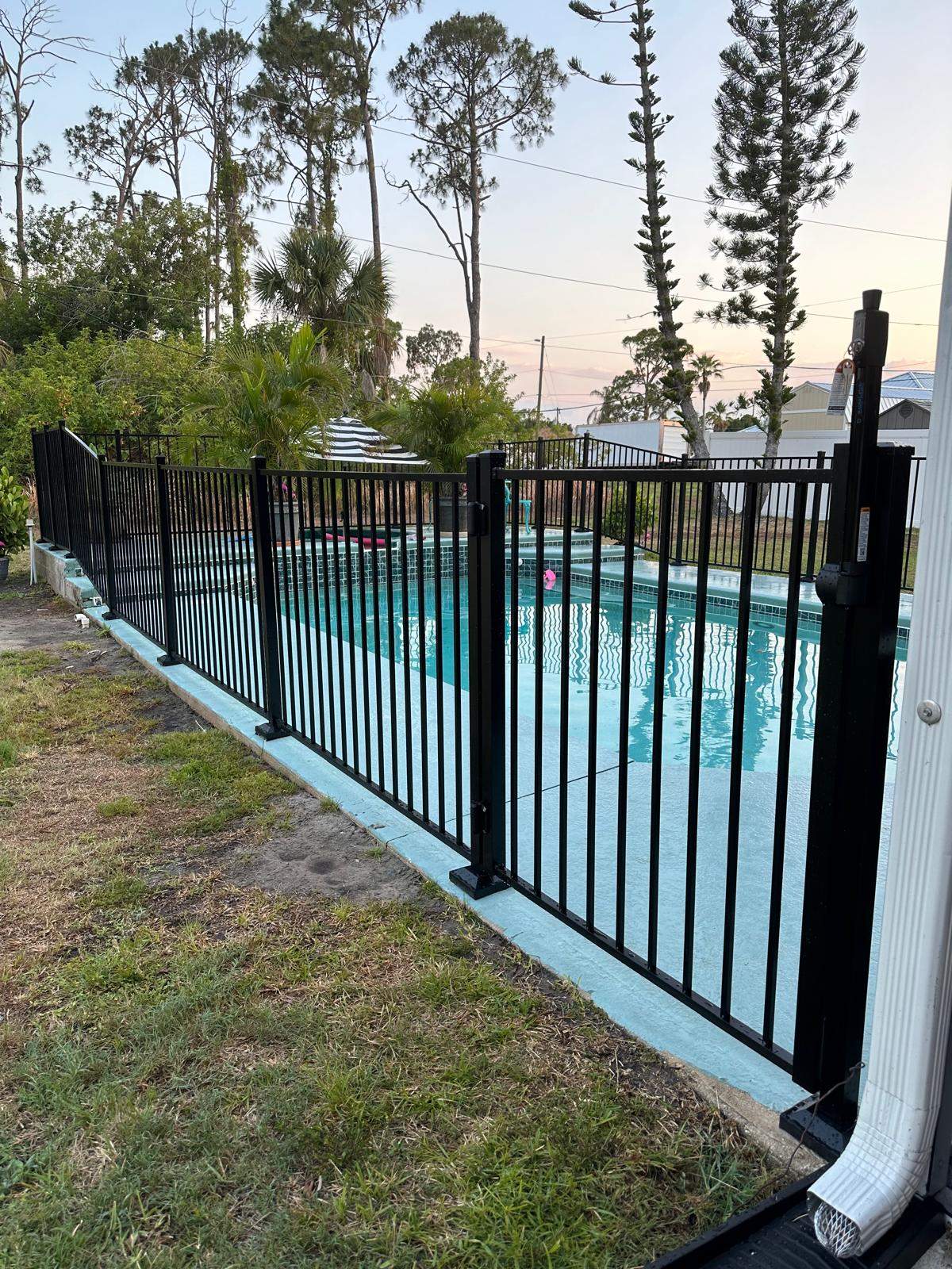 Black Aluminum Pool Fence Installation in Port Charlotte by True Fence LLC