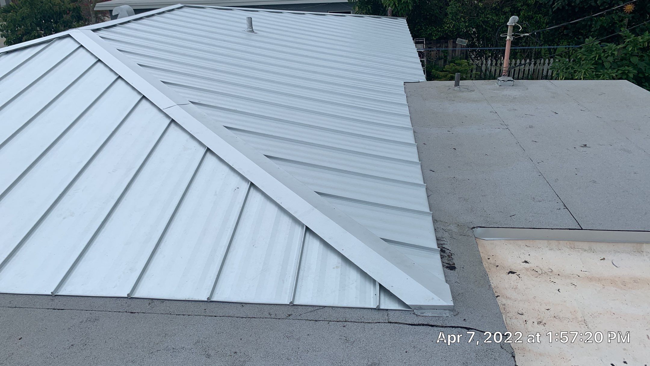 Residential Roofing Installation using 1" Nail strip metal roof by BLUES BROTHERS CONSTRUCTION CORP