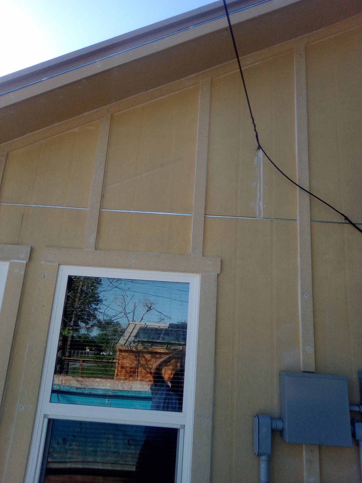 Vinyl to Hardie by Bayfront Roofing and Construction
