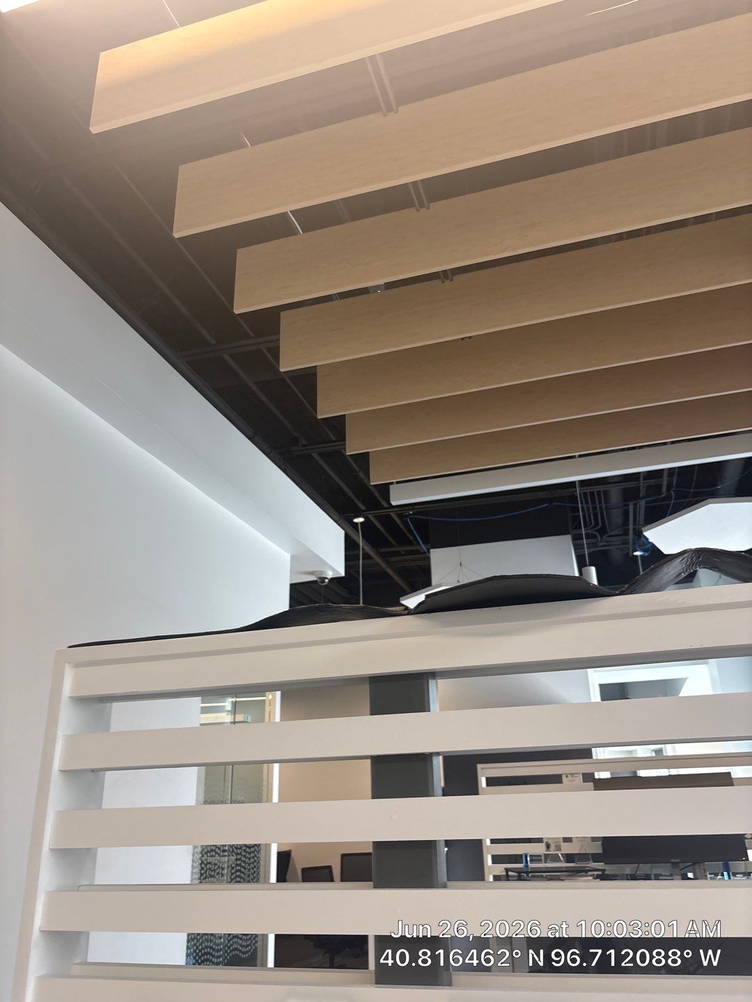 Modern Office Remodel Featuring Custom Acoustic Baffles in Lincoln by CompanyCam Sales Demo