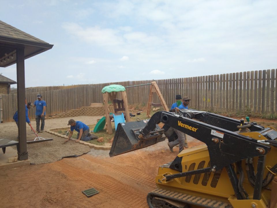 Retaining wall / Playground by Clays Services Inc
