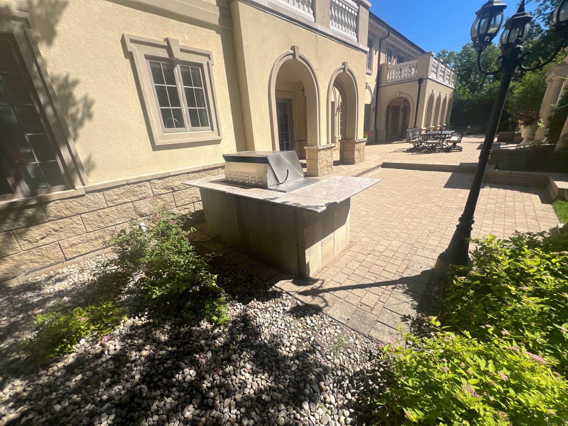 concrete cleaning using Algaecide, soft wash soap by Northern Power Washing LLC.