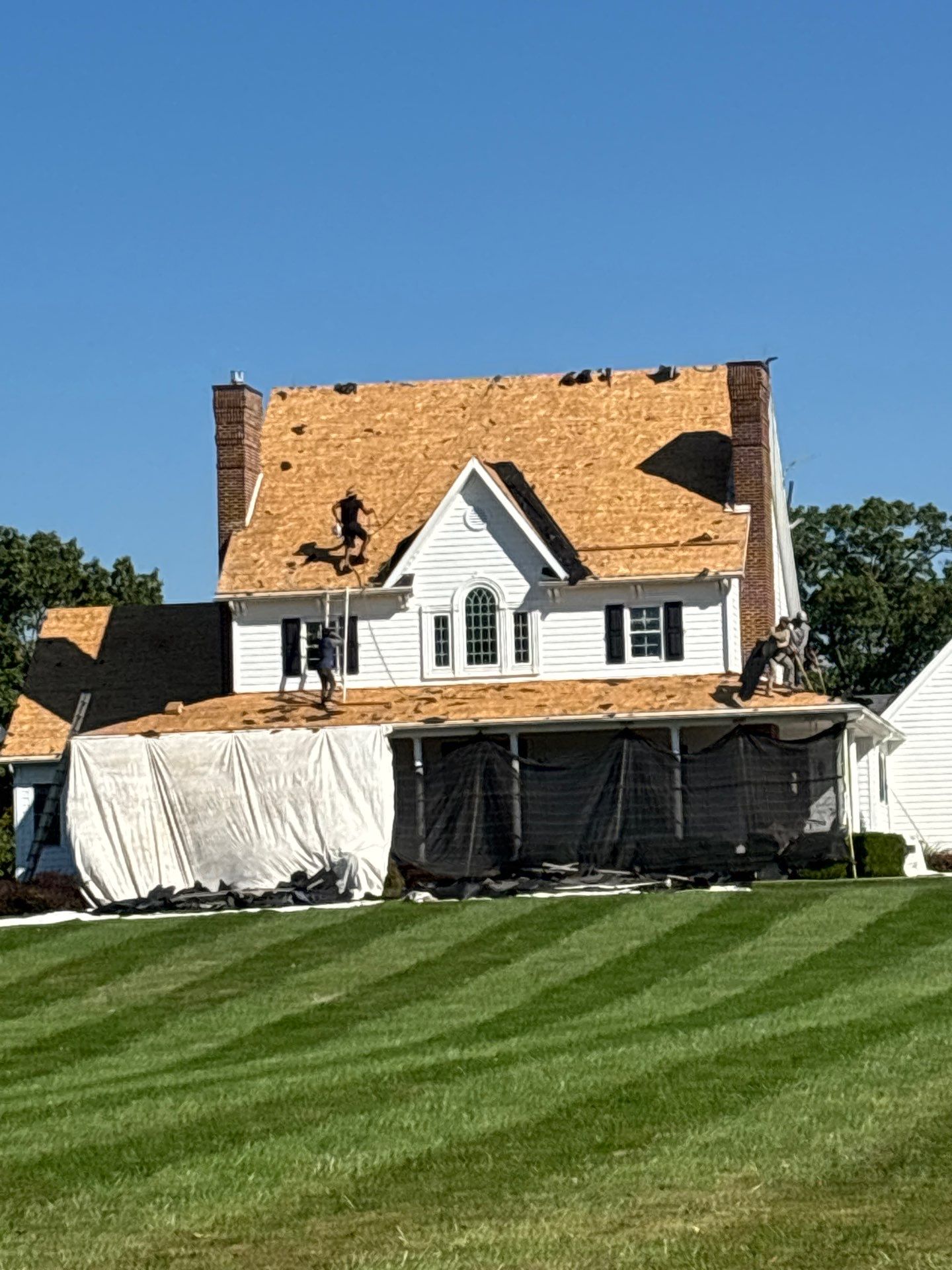 Residential Roofing Installation using GAF Timberline HDZ Charcoal by Rainstoppers Roofing