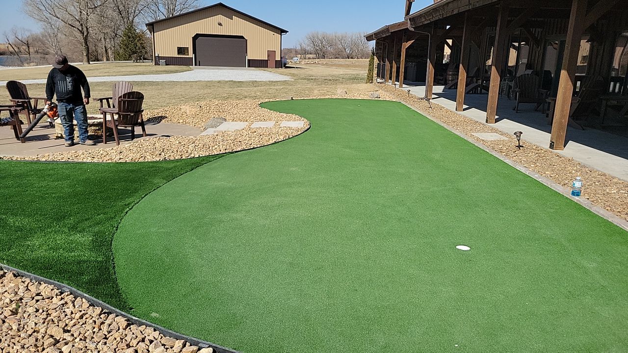 Putting Green / Driving Range / Entertaining space. by New Horizon Landscapes