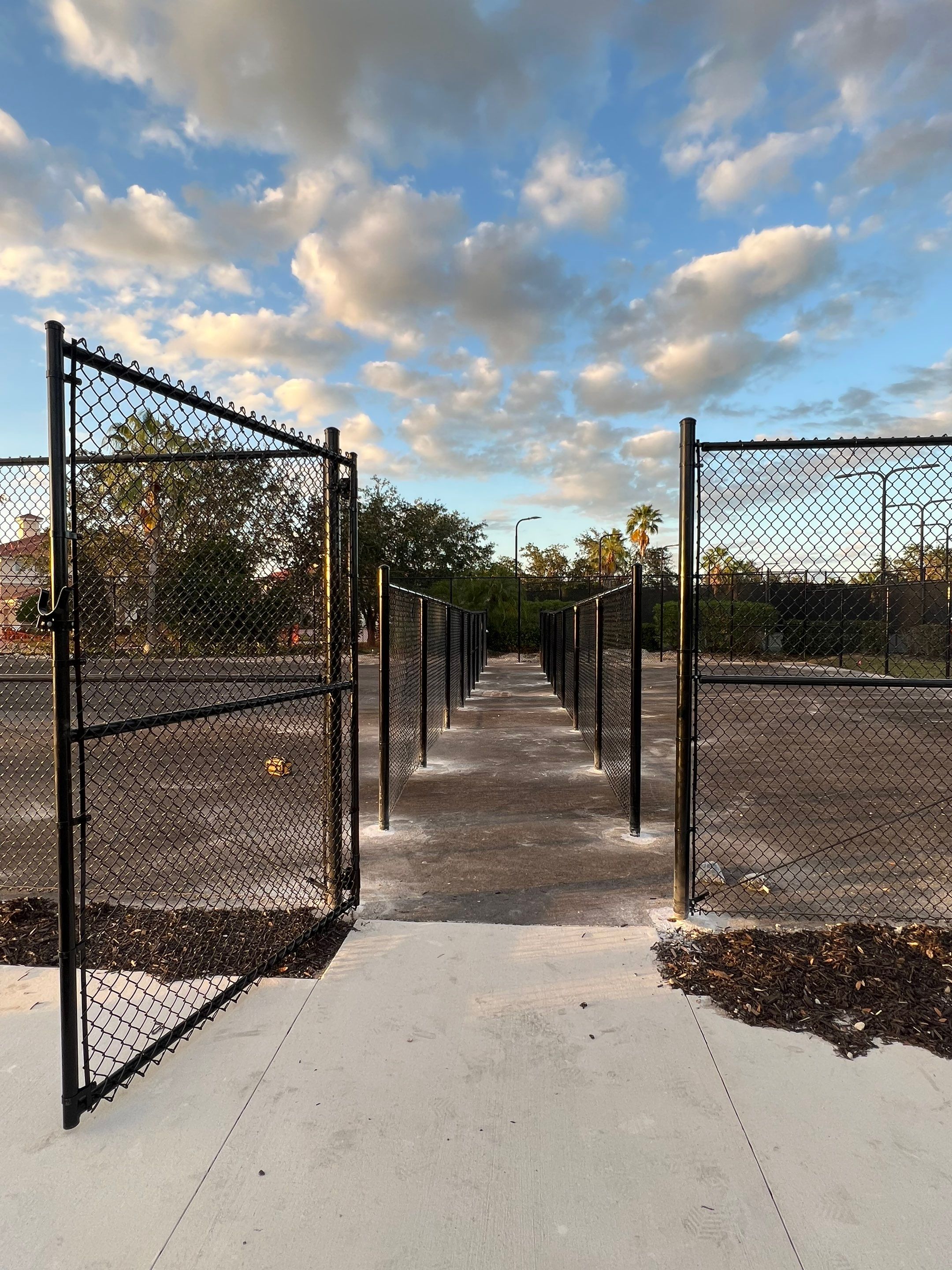 Chain-link Fence Installation using 8Ft Tall Black Chainlink Fence by Asap fence and gates, LLC