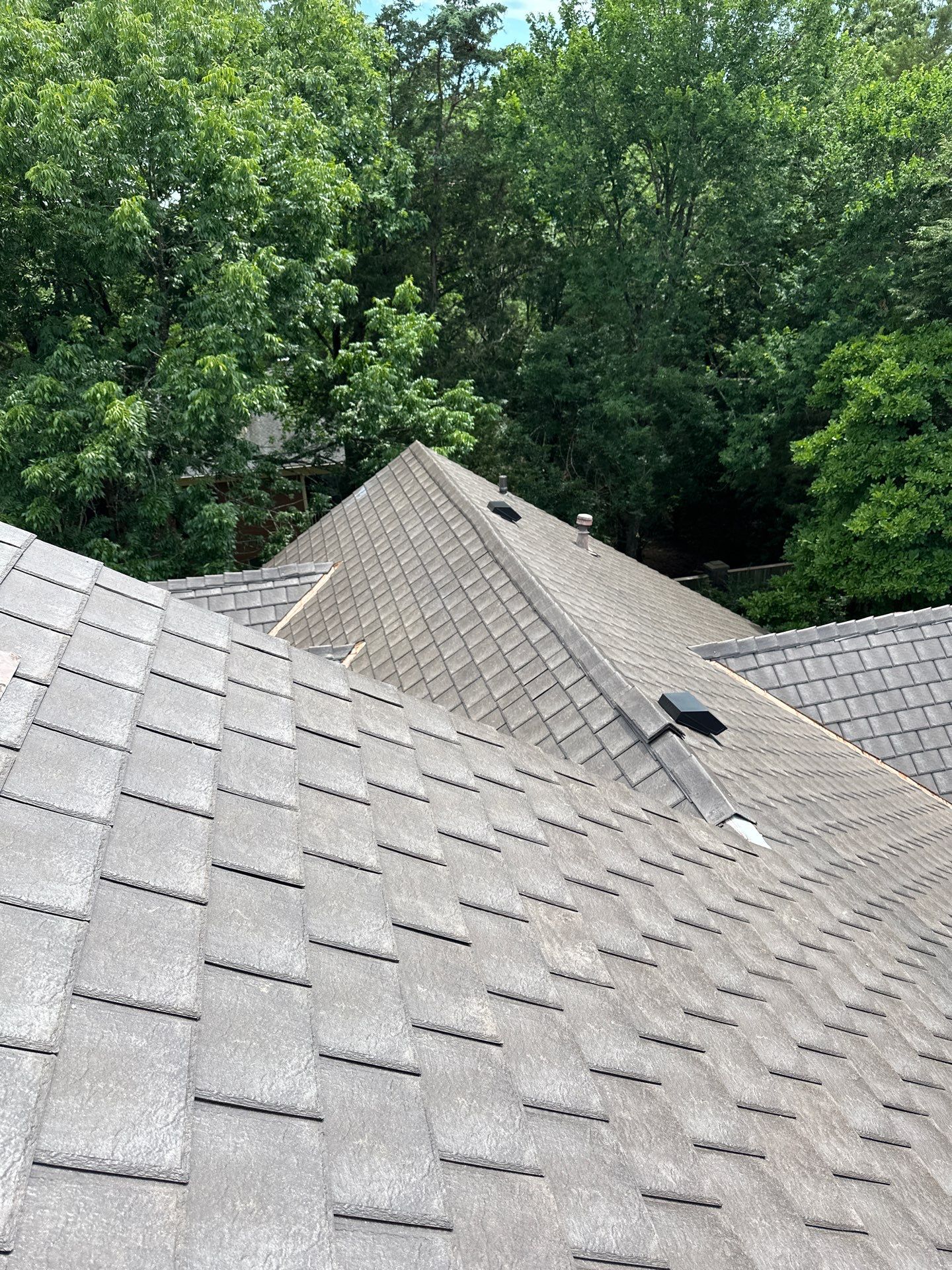 Residential Roofing Installation Using Enviroshake Synthetic Slate by Undersun Roofing 