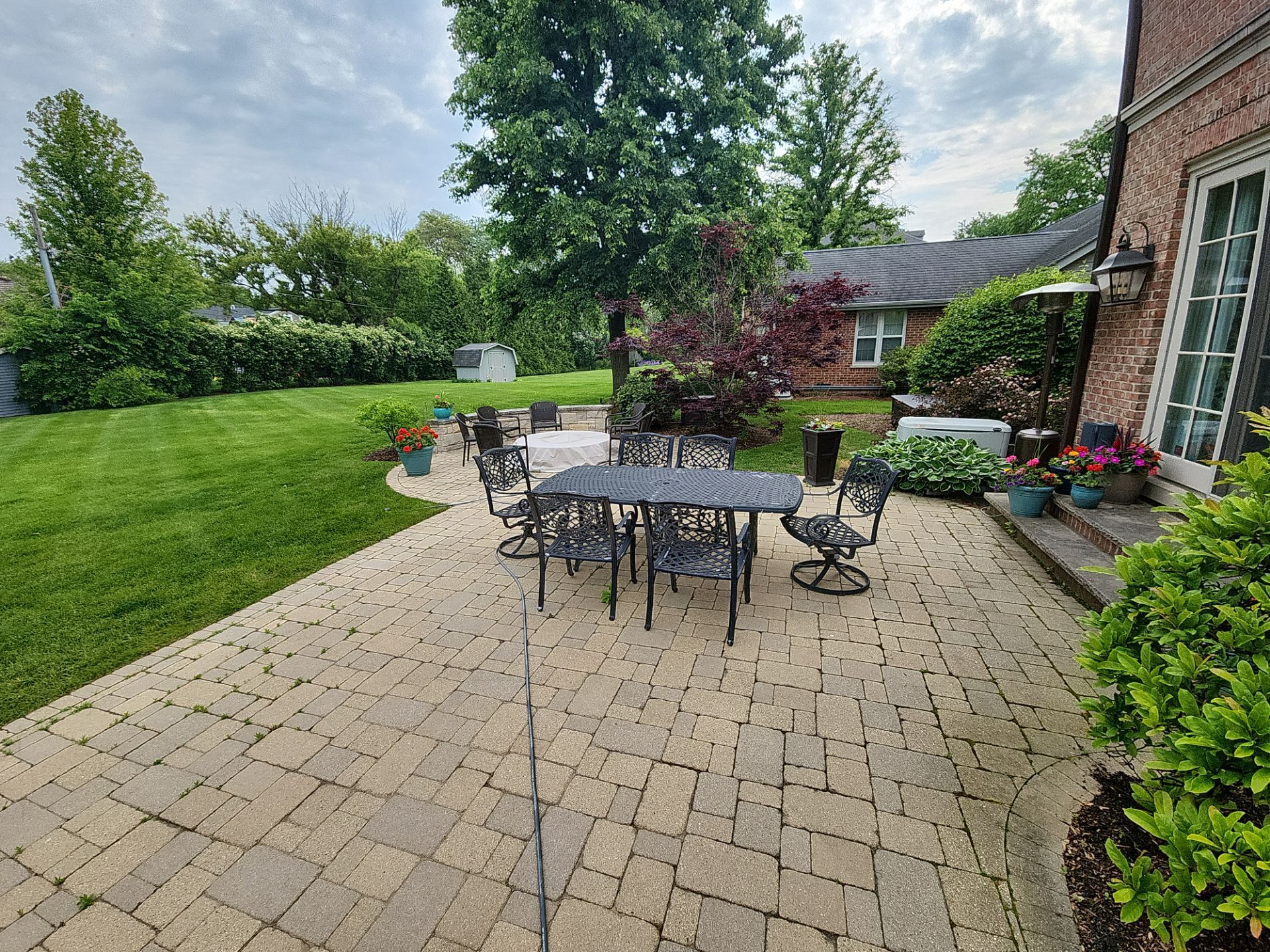 Brick paver repair, cleaning sanding and sealing by Northern Power Washing LLC.