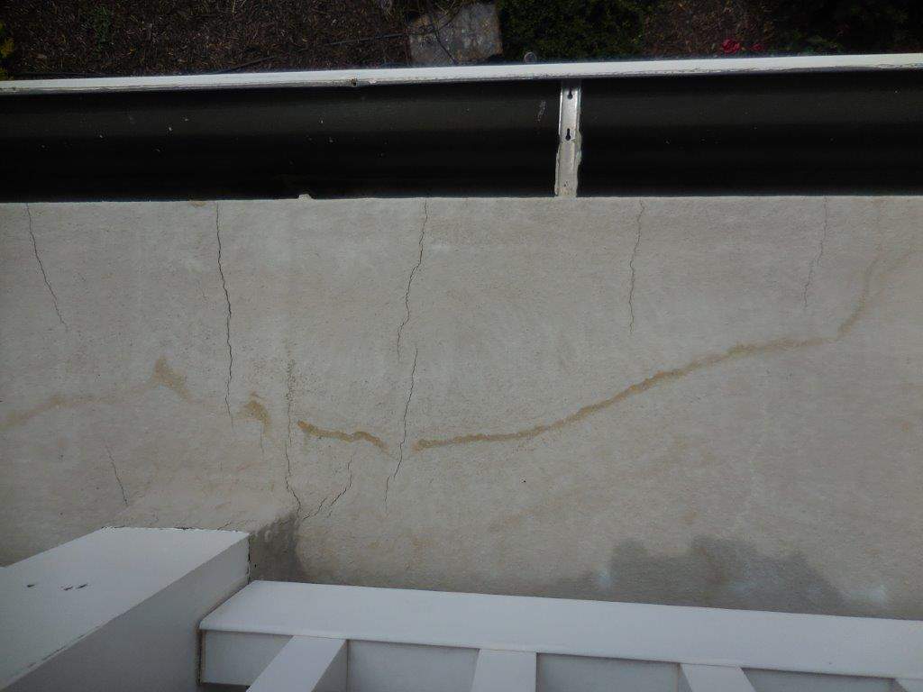 Sealant system over walk deck over house using Rubber coat and coatings by Straight Edge Roofing Inc