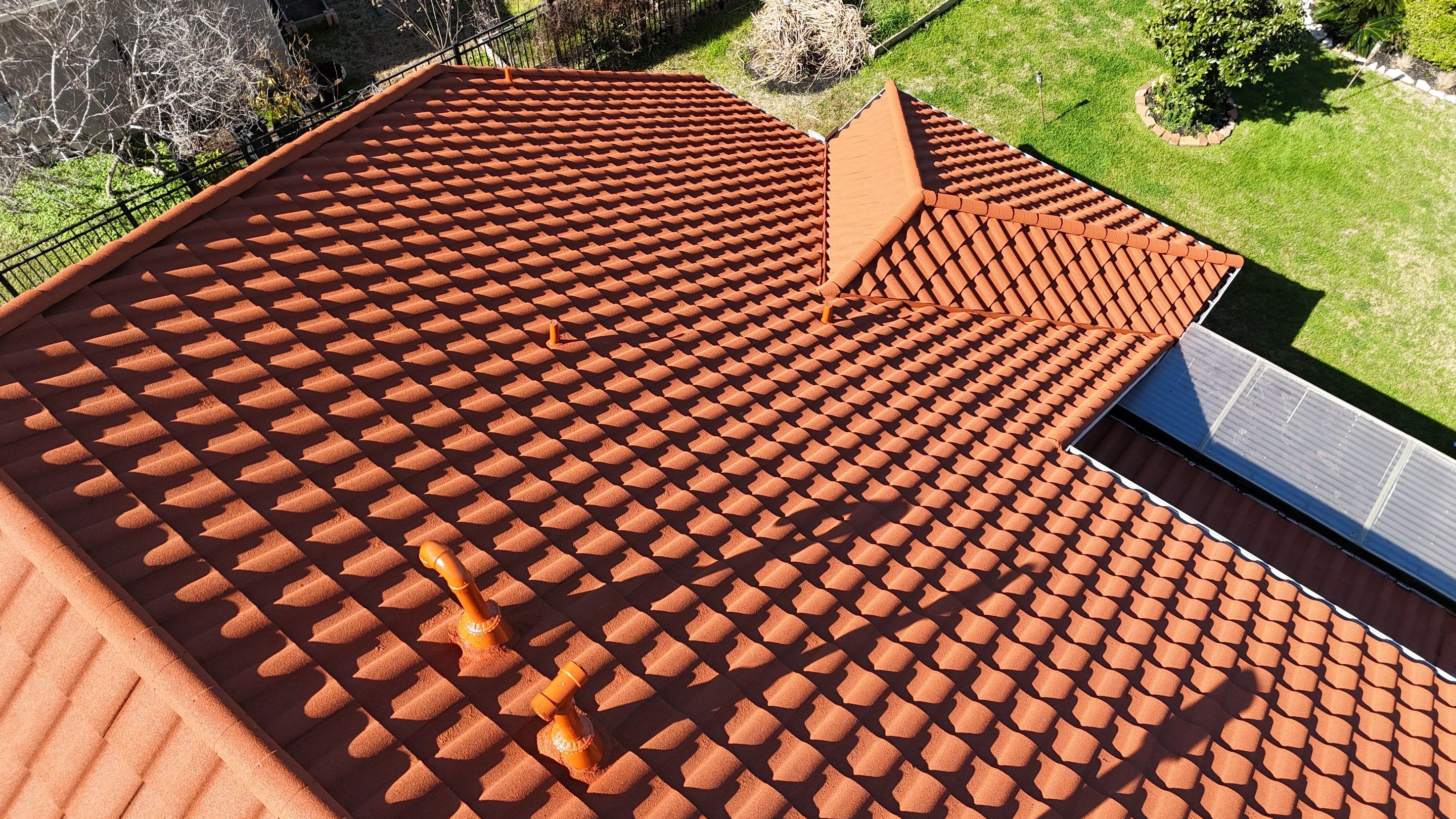 Stunning transformation using DECRA Villa Tile!  by Core Four Roofing
