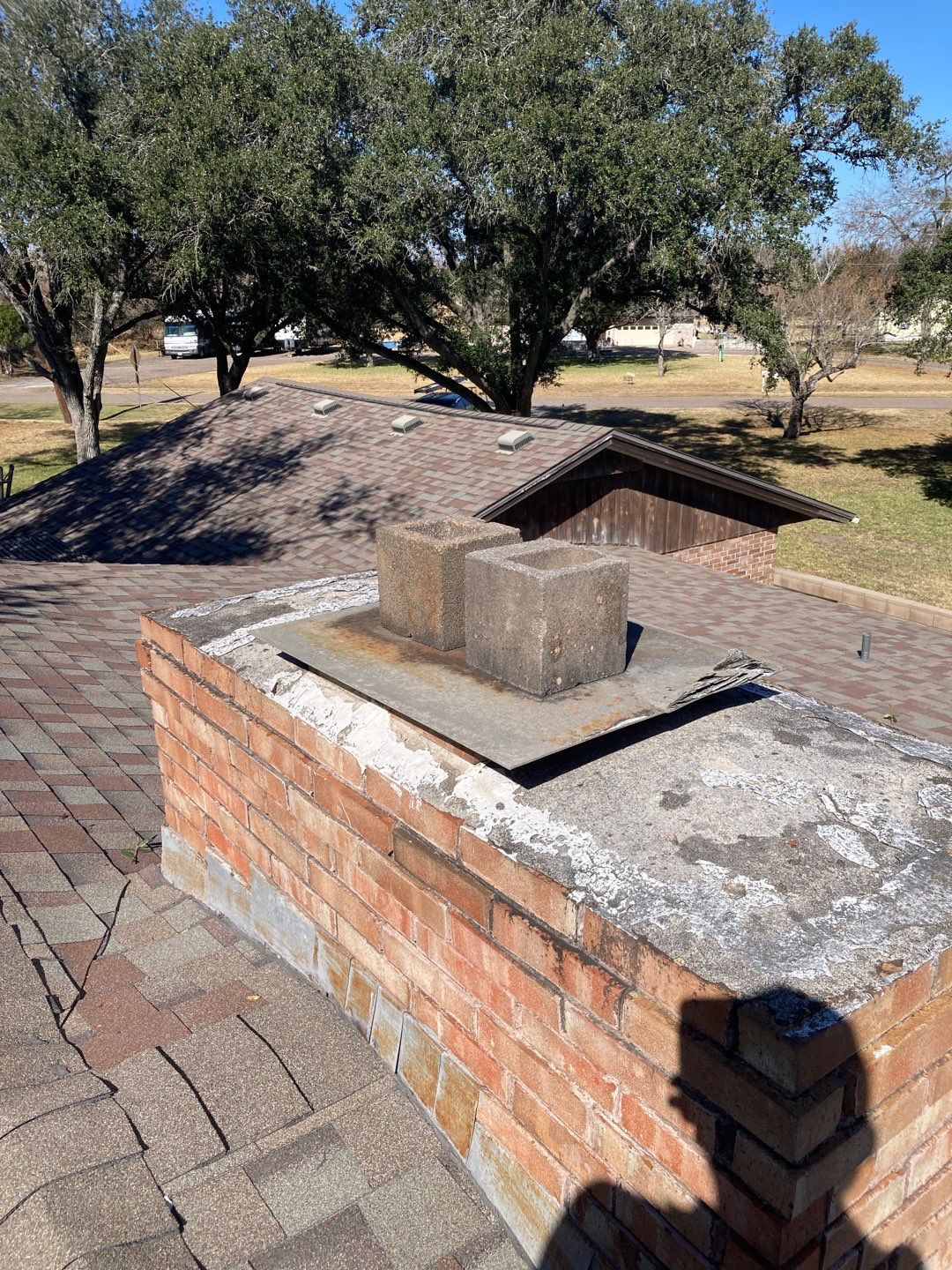 Residential Roofing Repair using Custom Fabricated Metal Spark Arrestor by Lighthouse Roofing