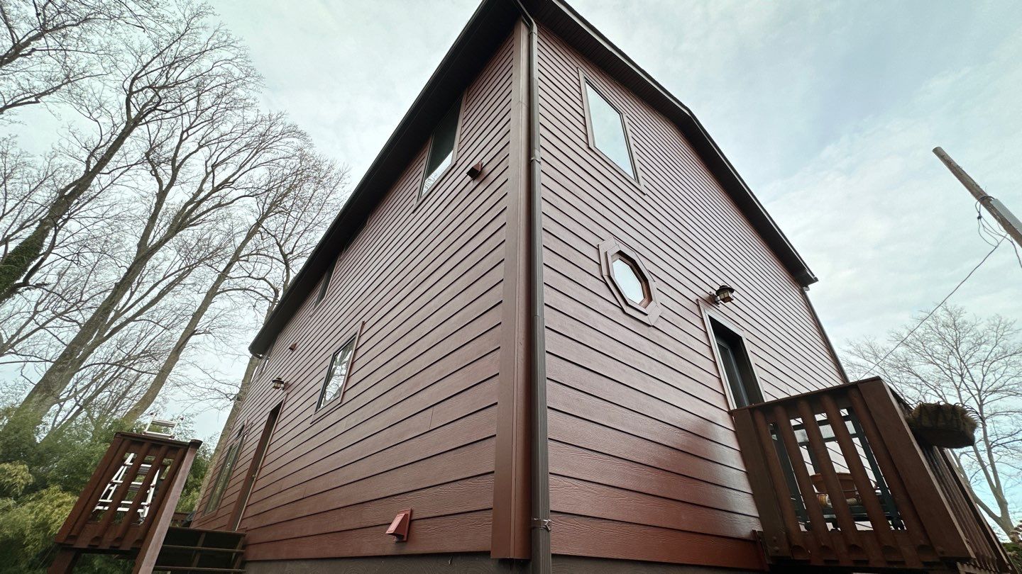 Siding Installation using JH Plank Select Cedermill Eased Edge by ExteriorPros