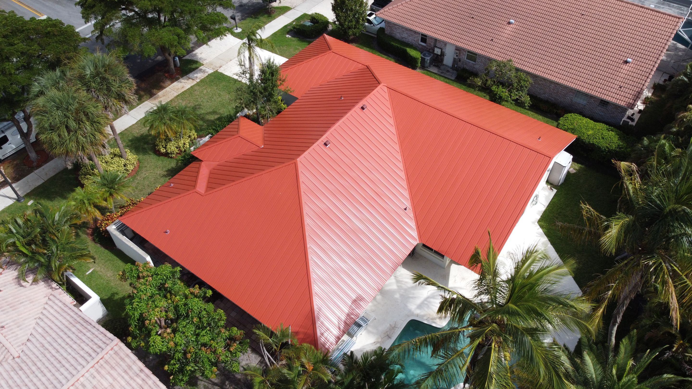 Residential Roofing Installation using 1" Nail strip metal roof by BLUES BROTHERS CONSTRUCTION CORP