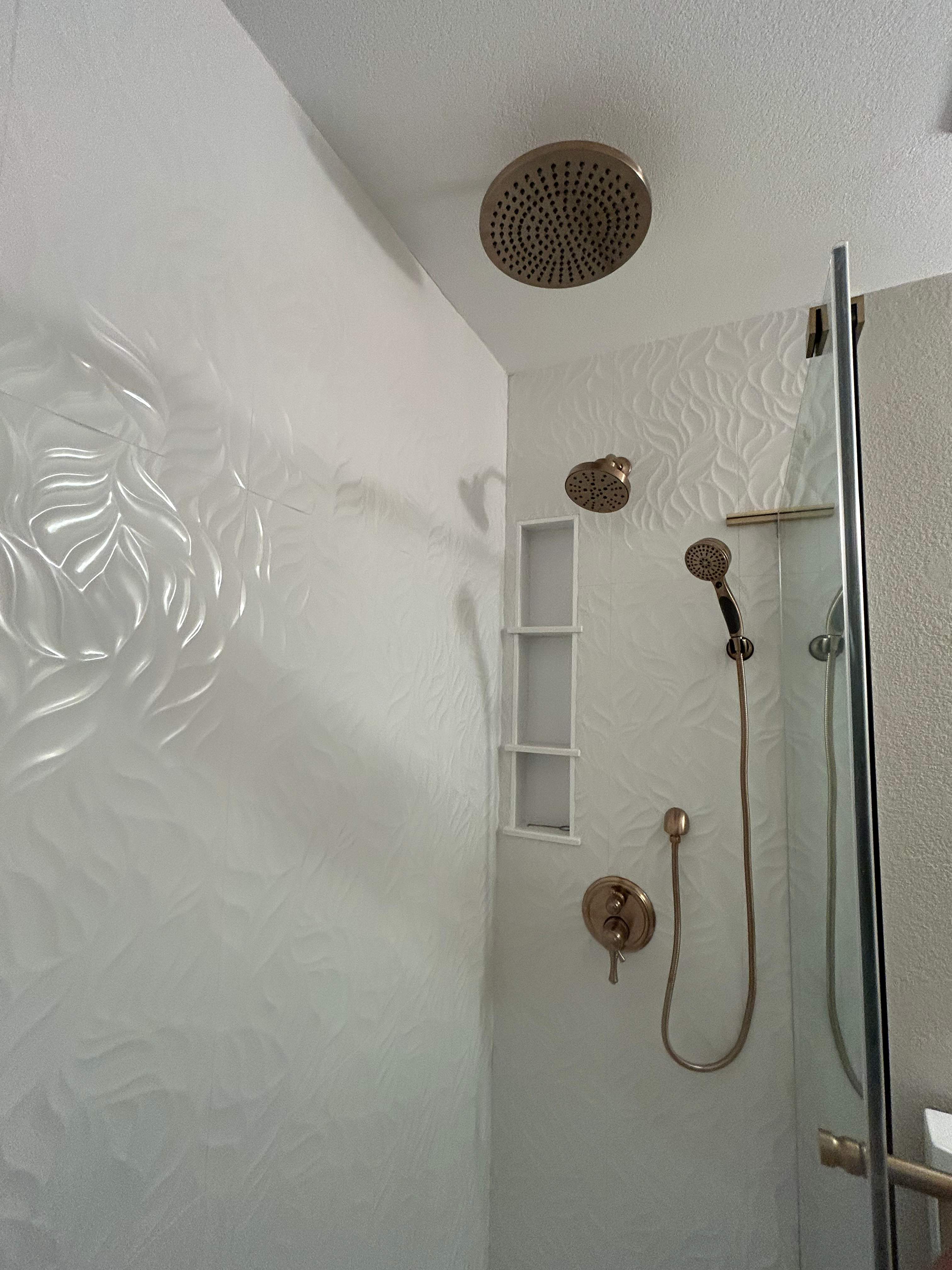 Guest bathroom remodel by SLM General Contractors & Roofing
