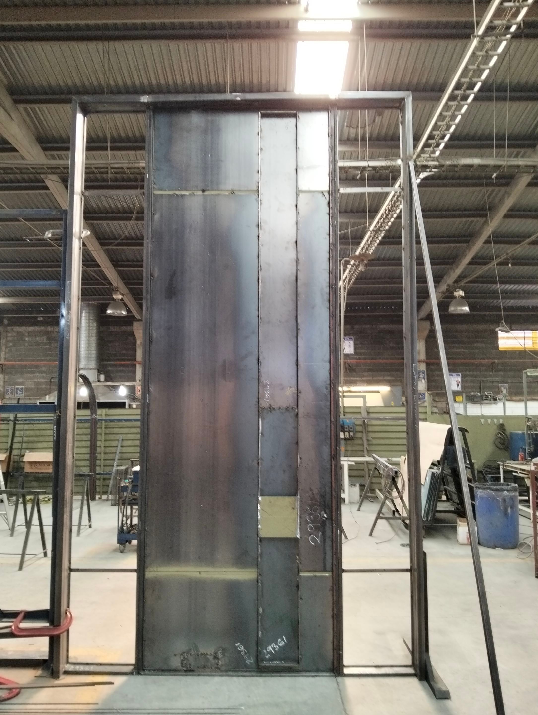 Custom Pivot Door and Structural Steel Frame Installation in Fort Worth by Solara Custom Living