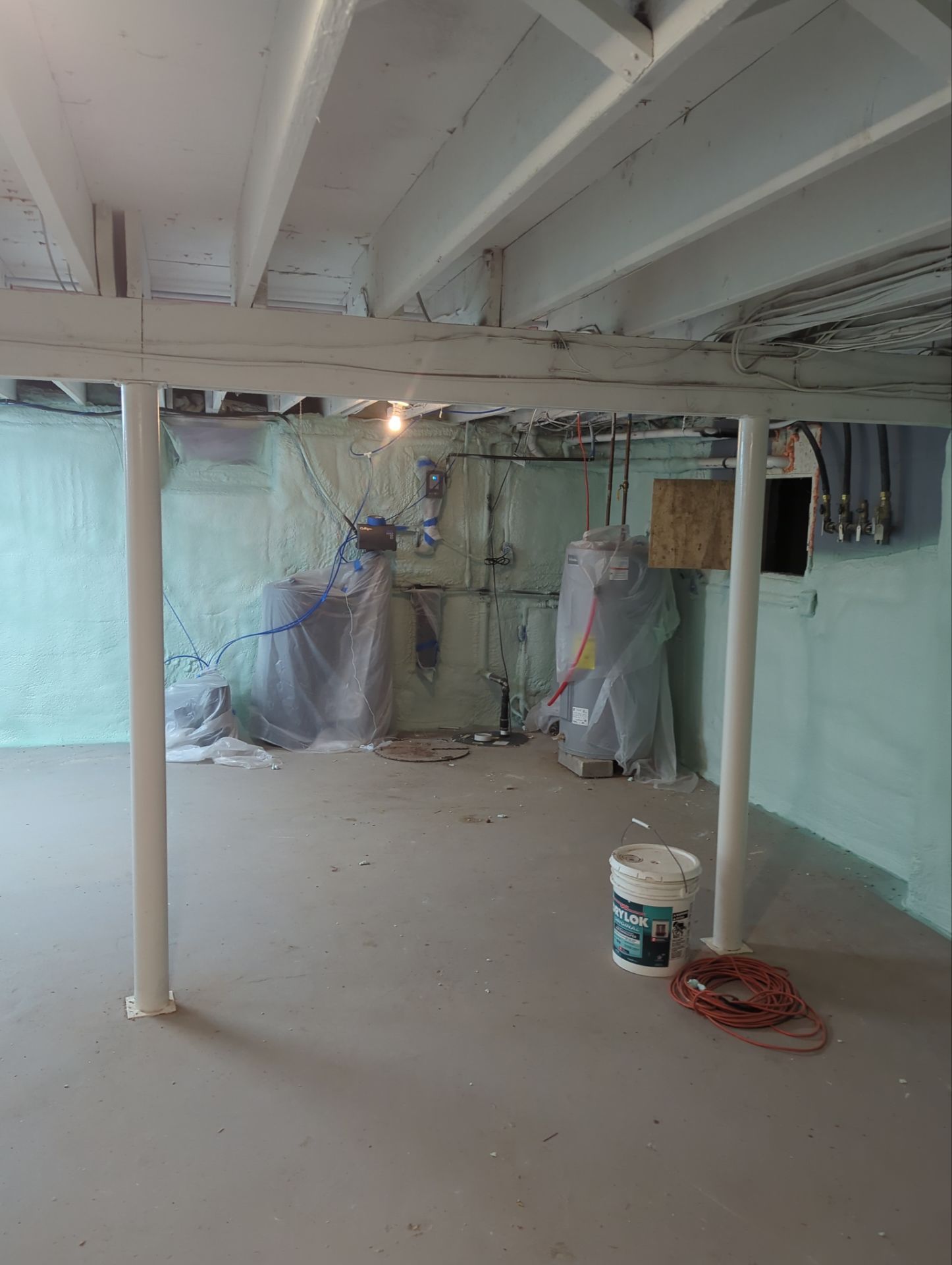 Basement Exterior Walls using Closed Cell Spray Foam by NYS Foam & Energy