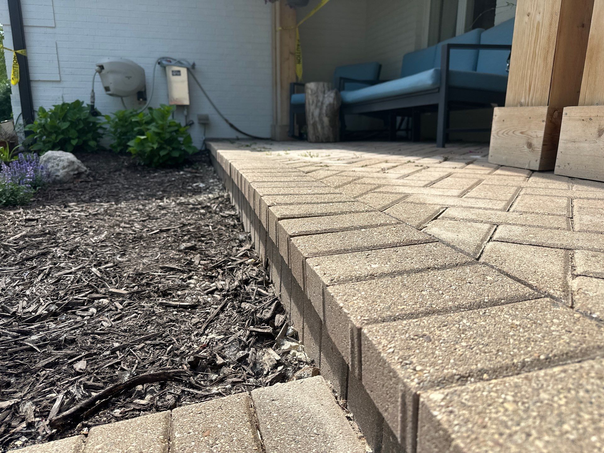 Brick paver repair, cleaning and sealing by Northern Power Washing LLC.