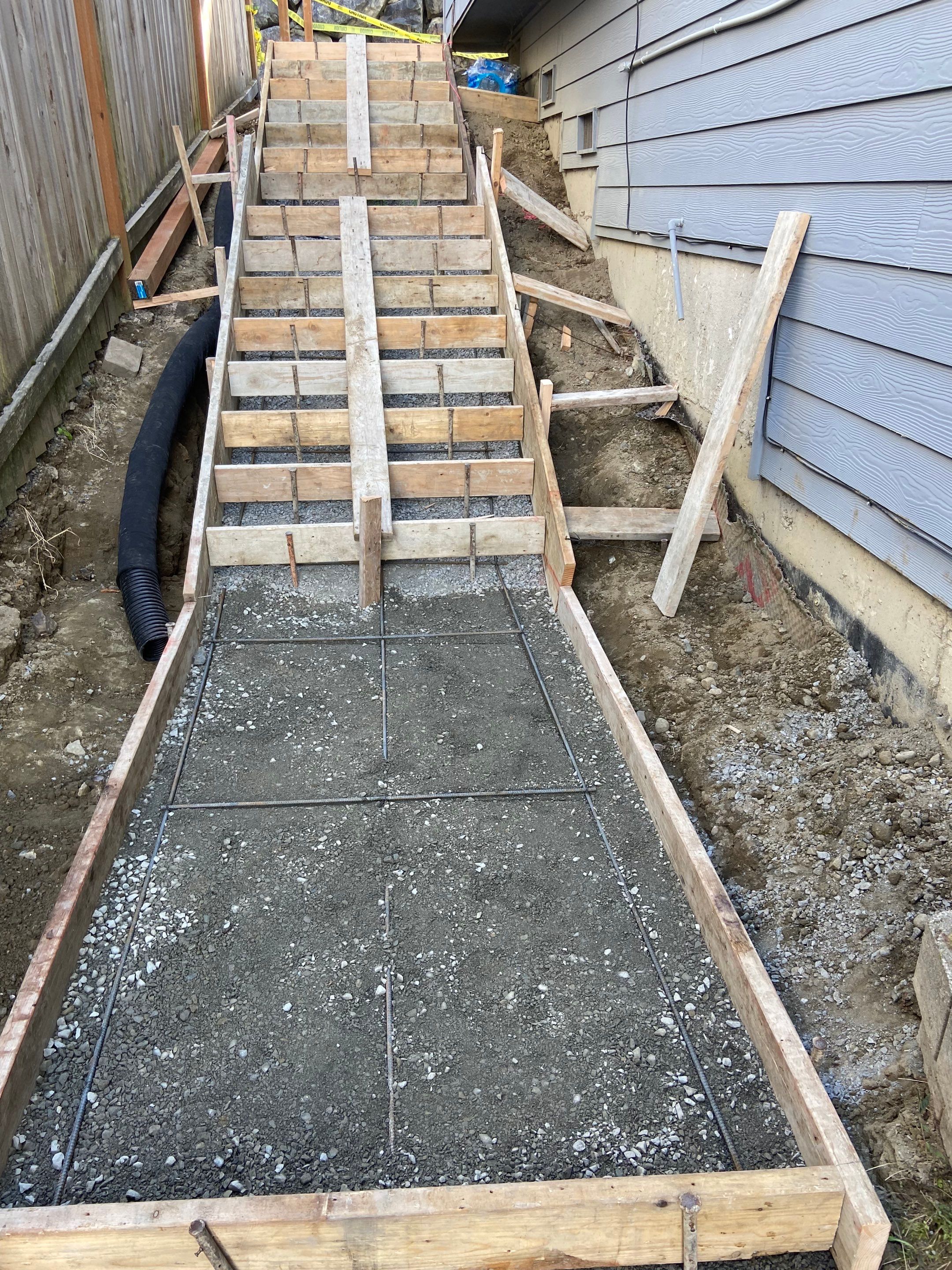 Jireh Outdoor Projects | Concrete Stair Repair and Retaining Wall by Jireh Asphalt & Concrete Inc 