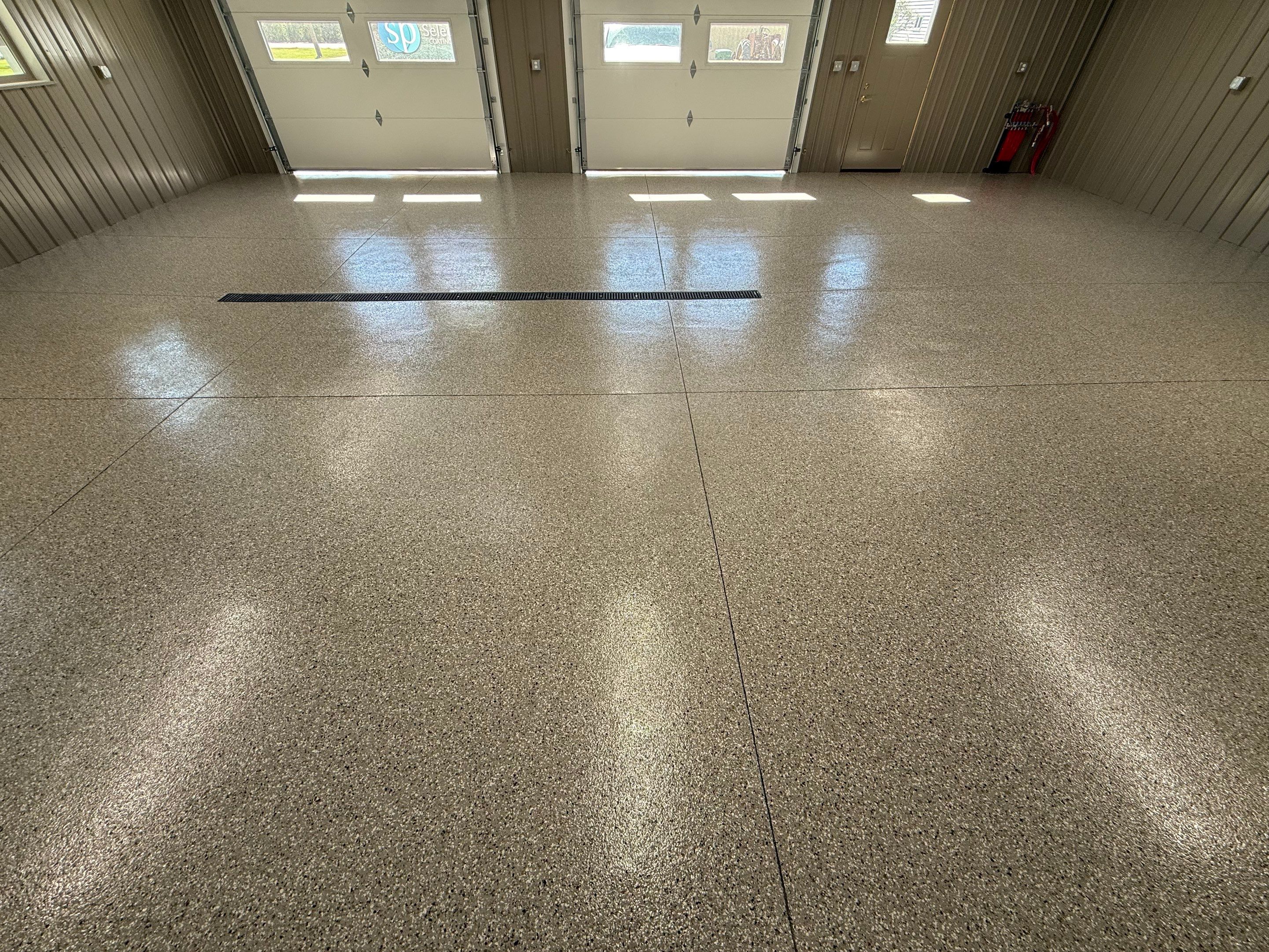 Creekbed Flake Coating in Woonsocket, SD by Select Painting, Coatings & Garage Cabinets