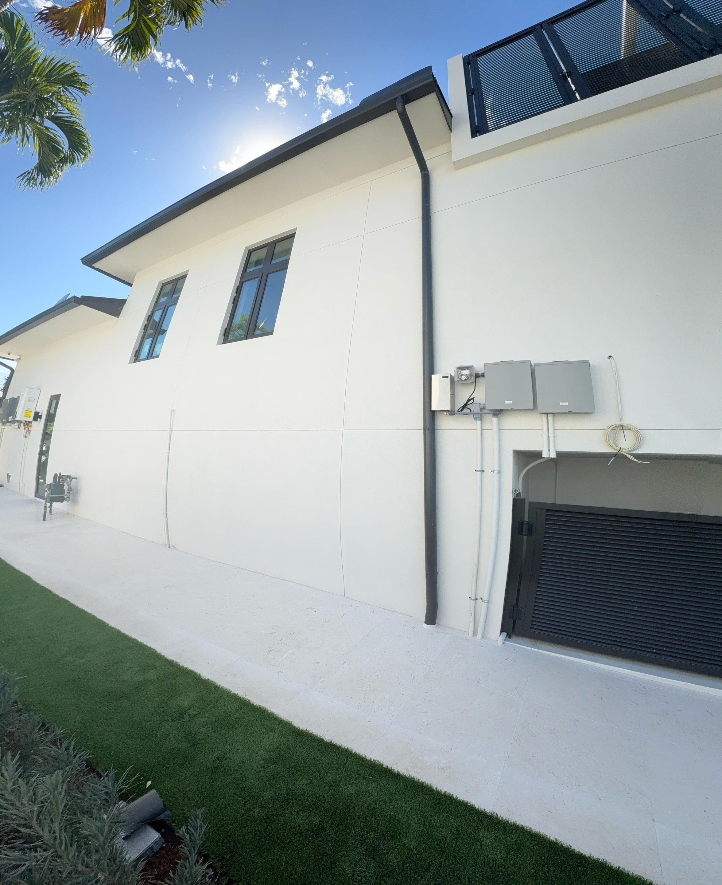 Seamless Aluminum Gutter Installation using black seamless gutters in Sarasota FL by Gutter Professors