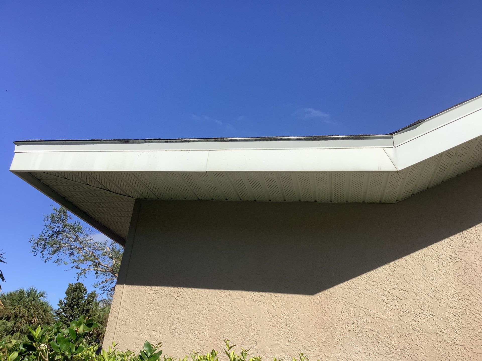 Black Seamless Gutters in Sarasota FL by Gutter Professors