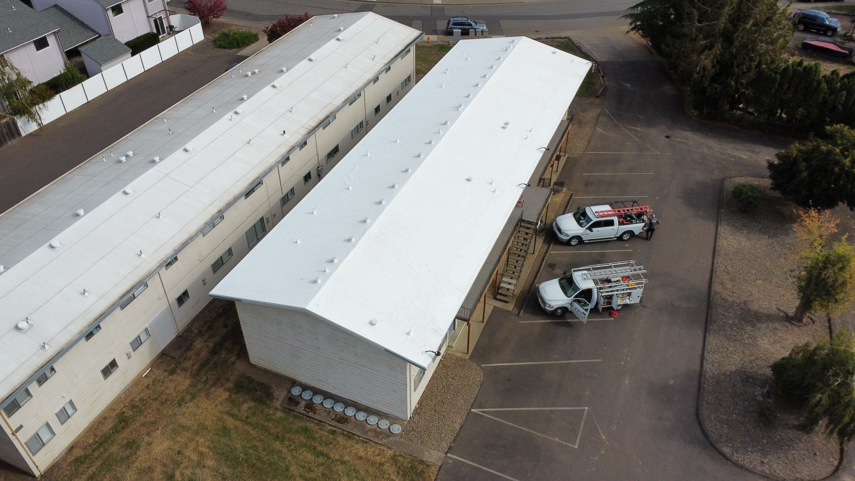 Commercial Flat Roof Installation using GAF 60Mil TPO  by Orezona Building & Roofing Company, Inc.