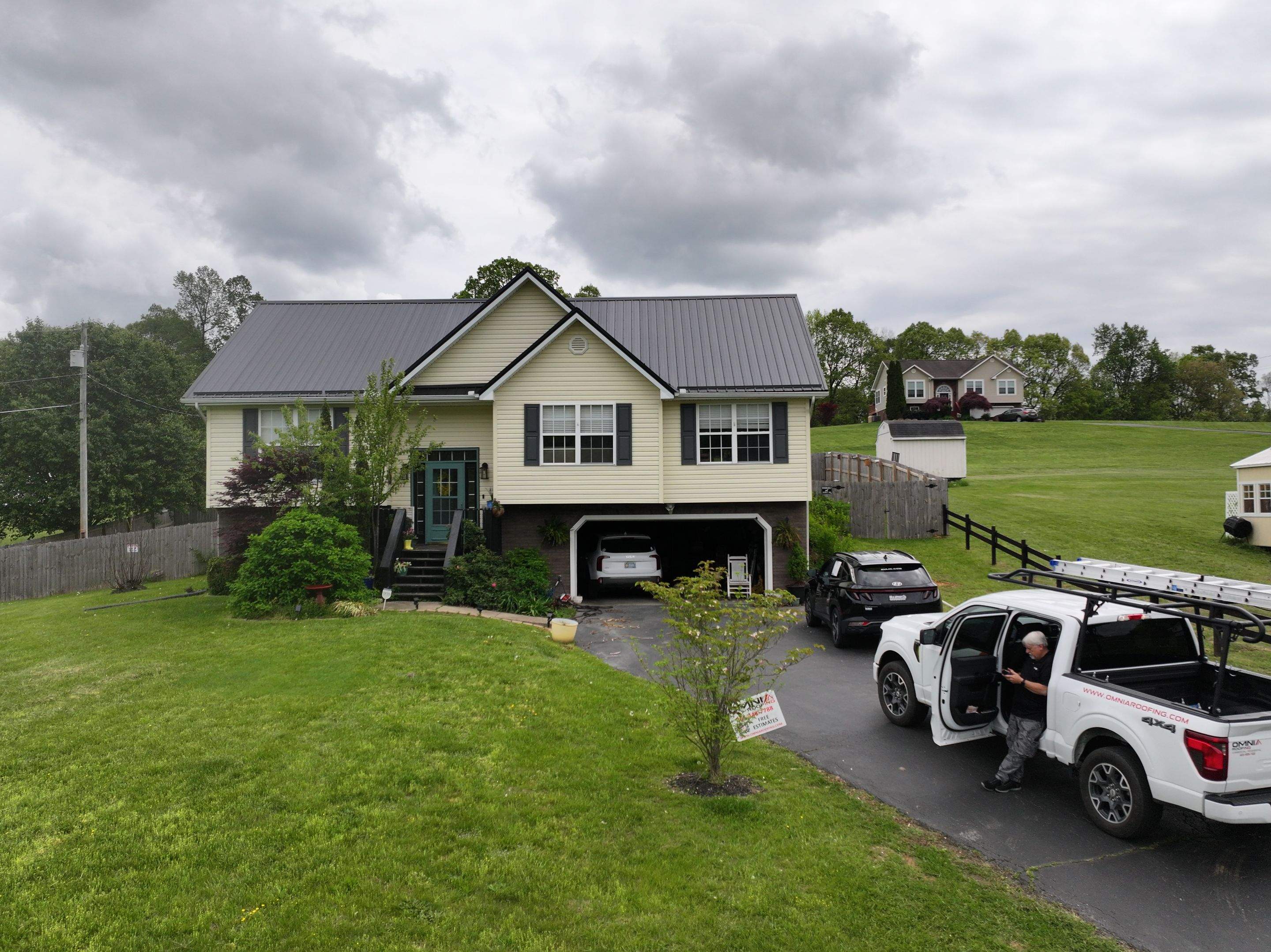 Stone Residence  by Omnia Roofing