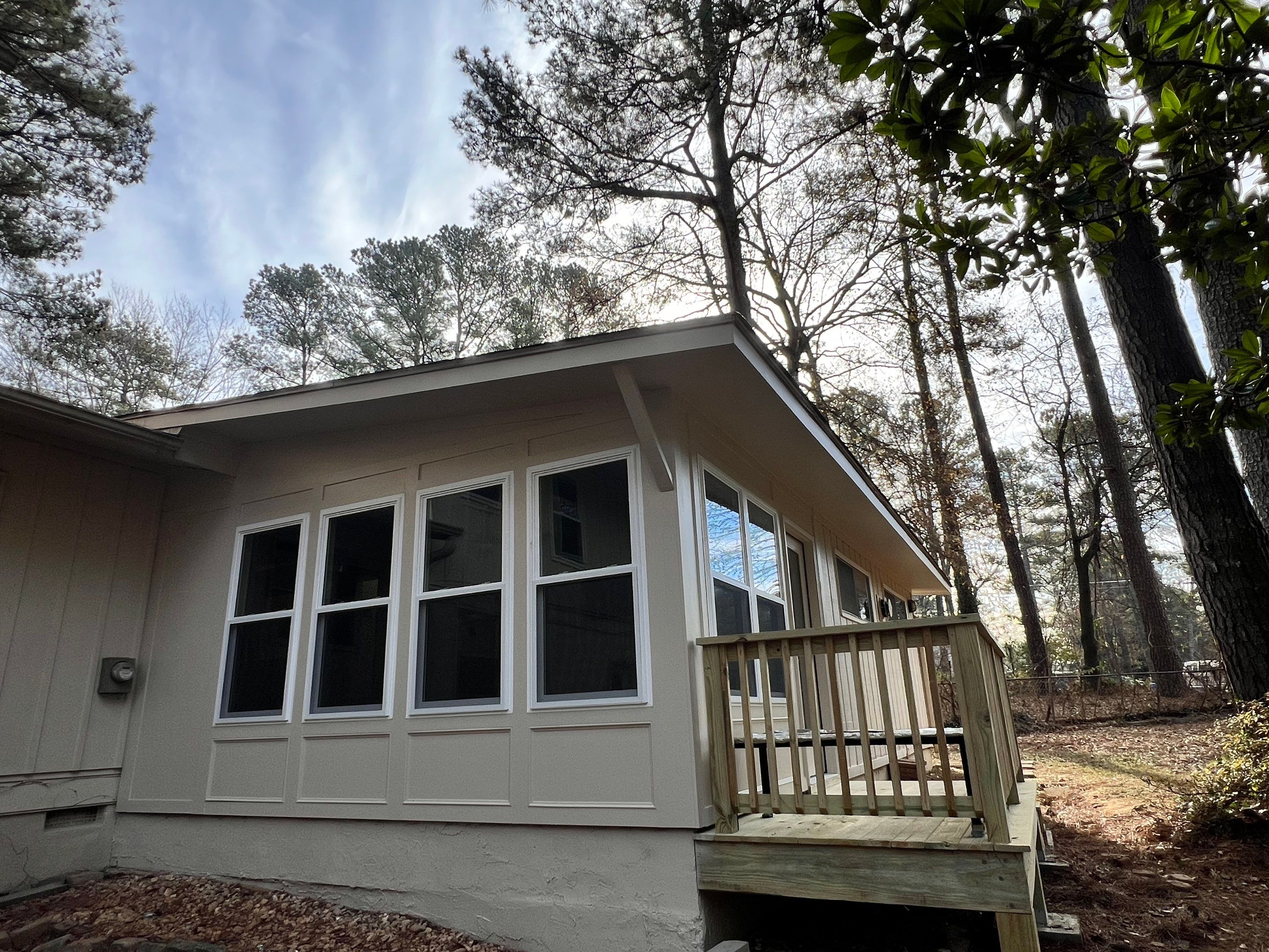 Sunroom Conversion and Pressure Treated Deck Installation in Doraville by Swift Home Renovations
