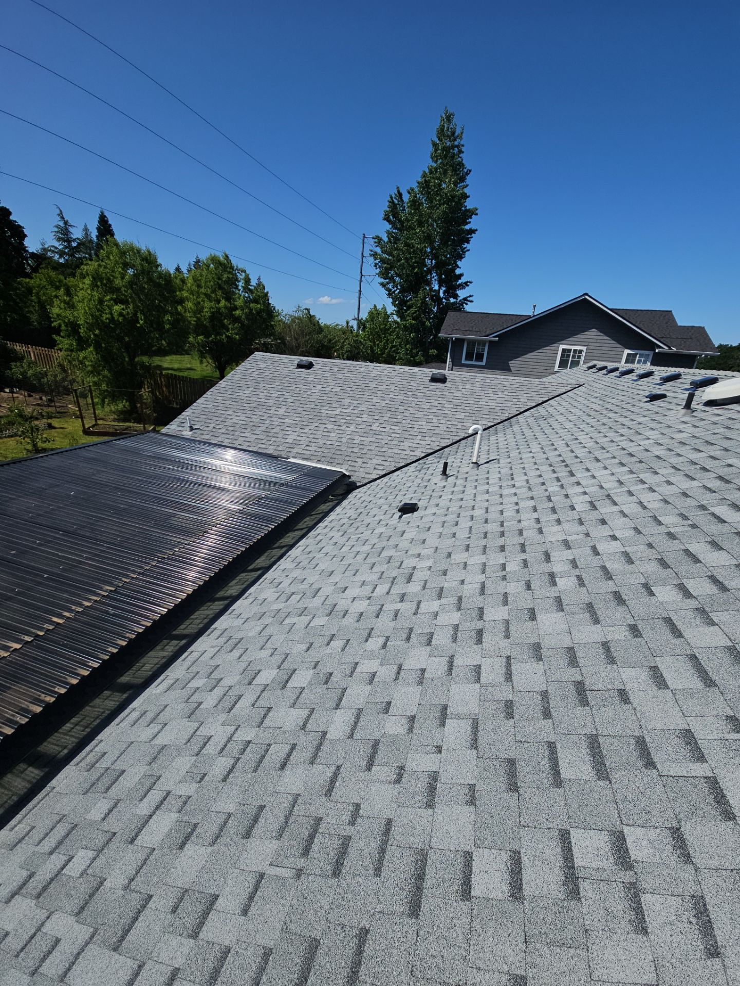 Residential Roofing Installation using IKO Cambridge (Color: Dual Grey) by Orezona Building & Roofing Company, Inc.