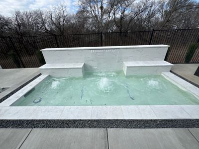 Sleek Modern Pool with Raised Back Wall