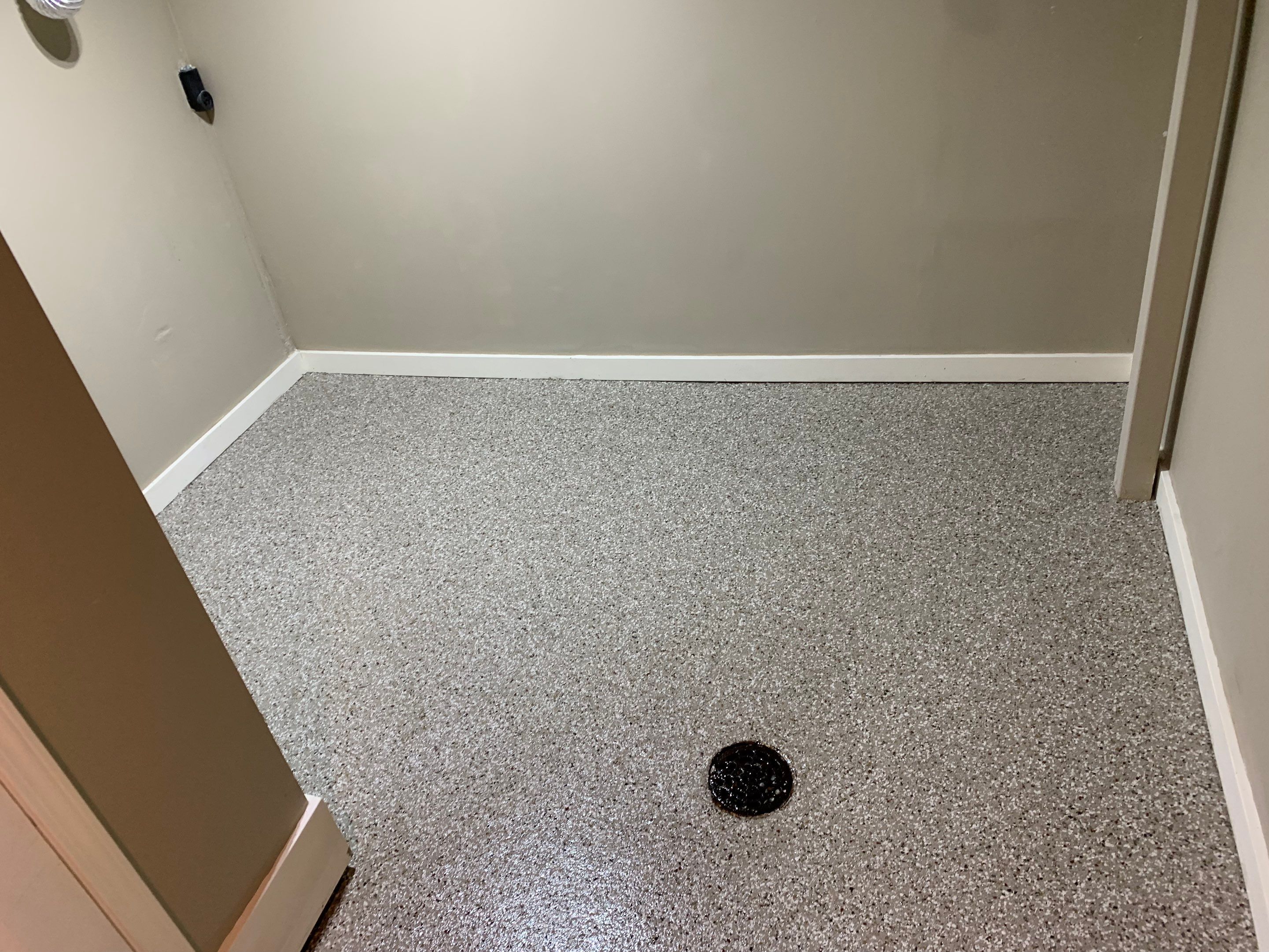 Basement using Pebble Beach by Select Painting, Coatings & Garage Cabinets