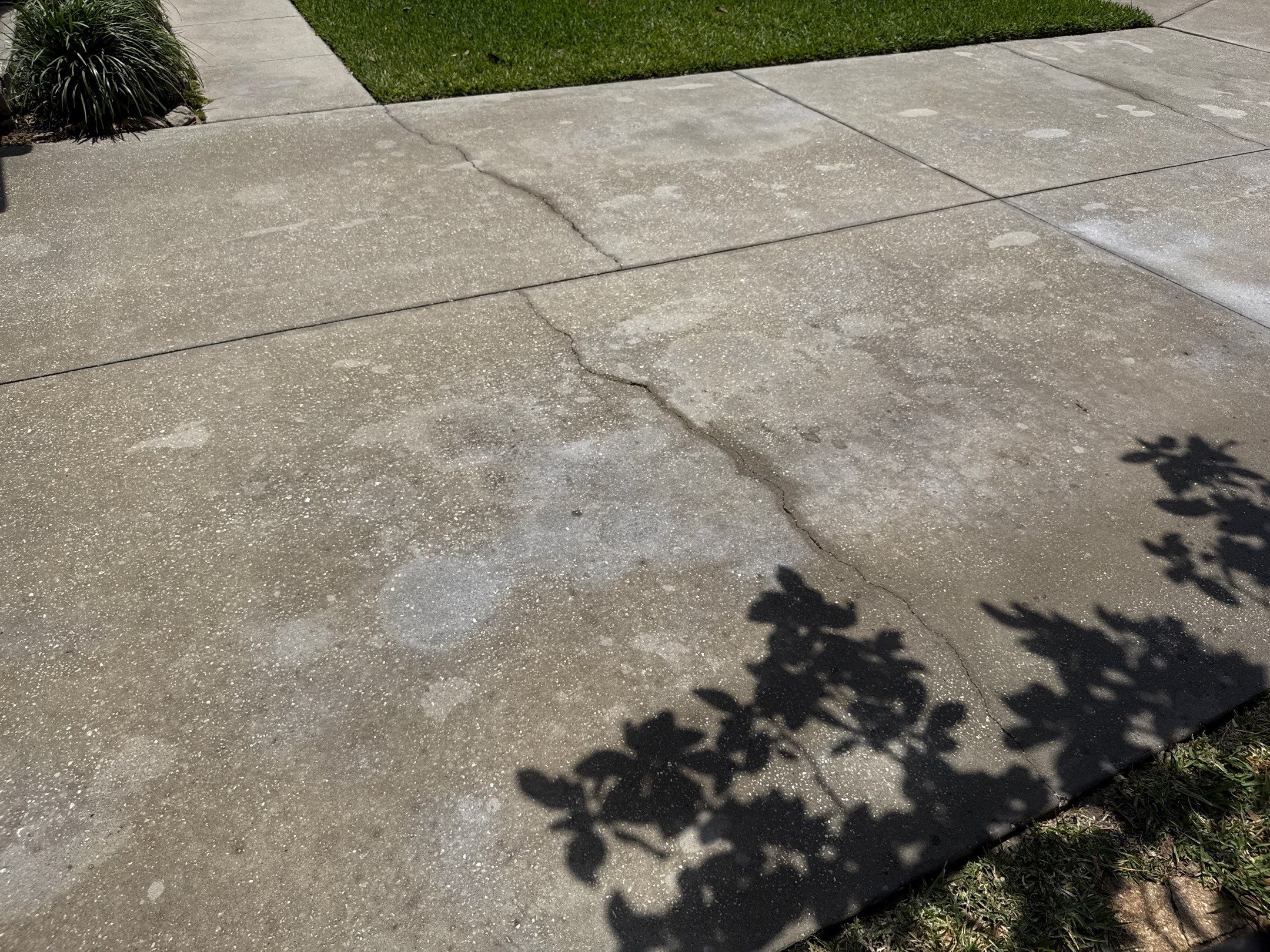 Concrete Driveway Oil Stain Removal | Harrison Ranch Community | Parrish, FL by Sunshine AquaWash