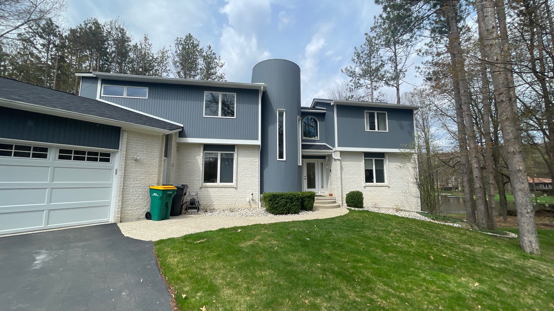 Siding Replacement using CertainTeed Board & Batten Pacific Blue by 180 Contractors