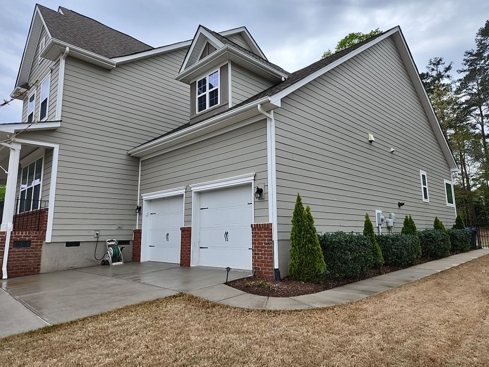 House Wash using cleaner by Power Wash Masters LLC