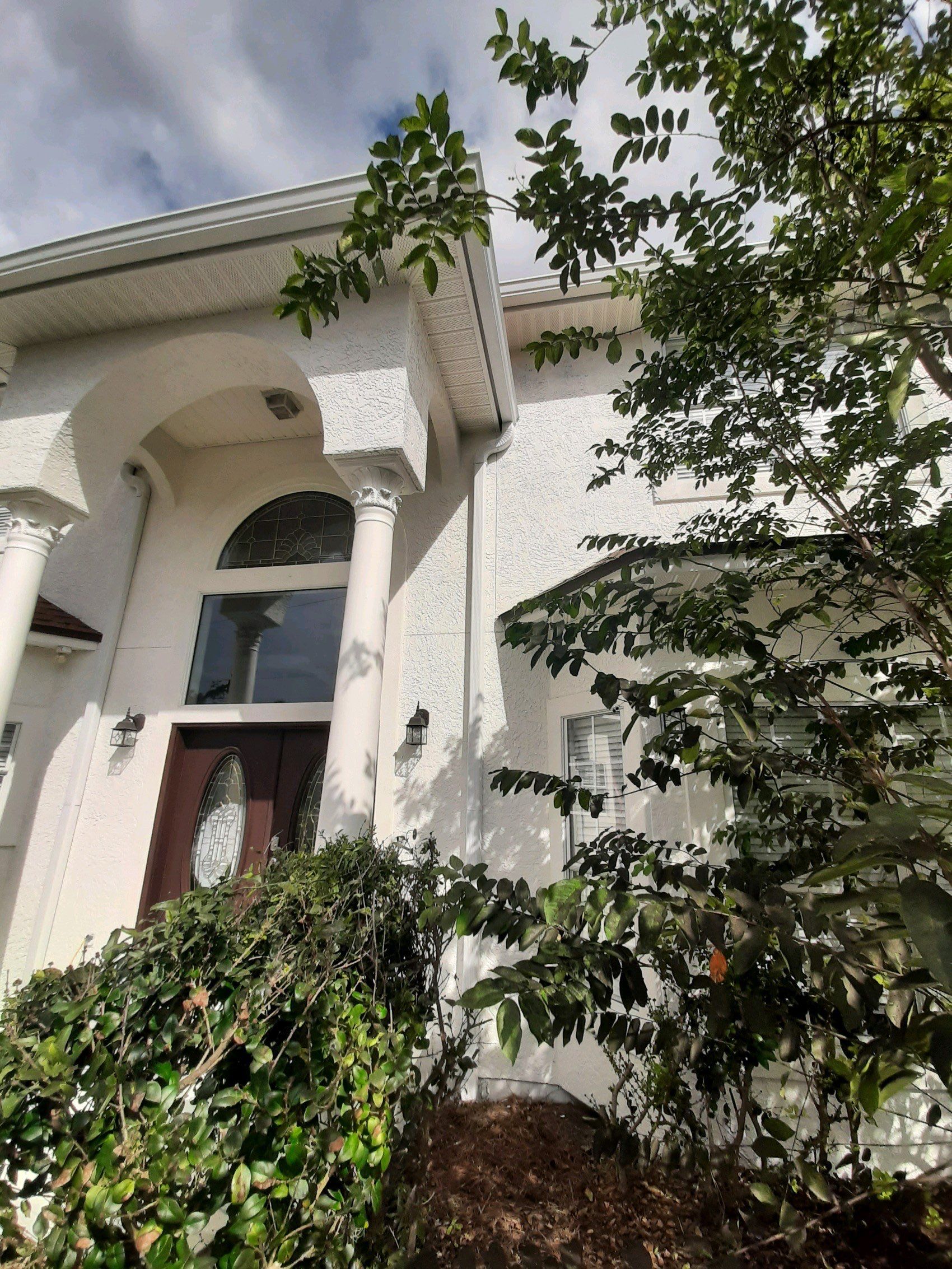 Seamless Gutter Installation using White K-Style Gutters by Gutter Professors