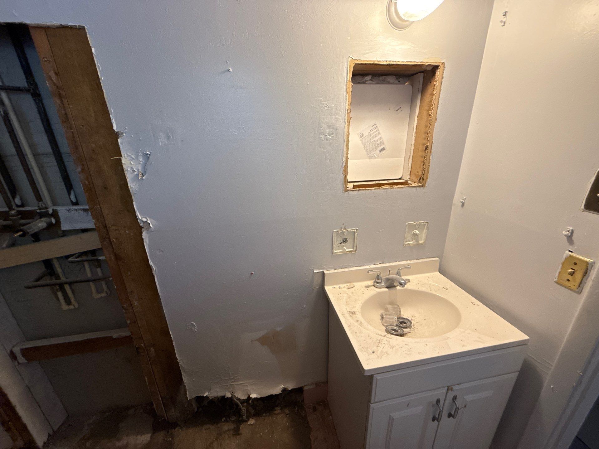 Dual Bathroom Makeover by urban green energy llc