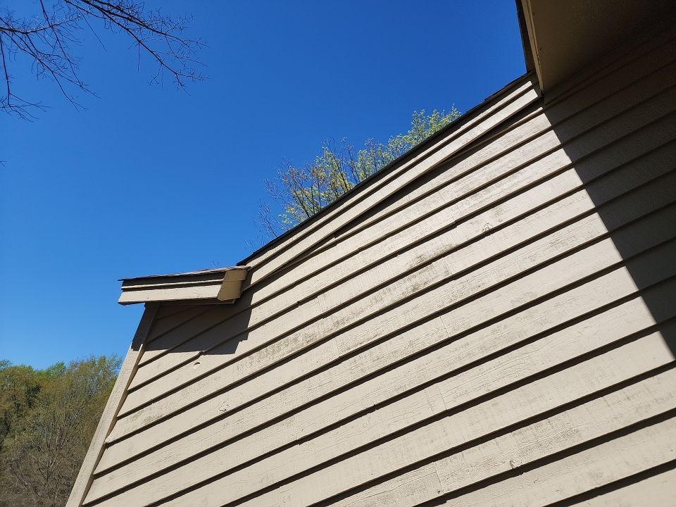 Exterior renovation using James Hardie Siding and Simonton Windows by Indigo State Roofing