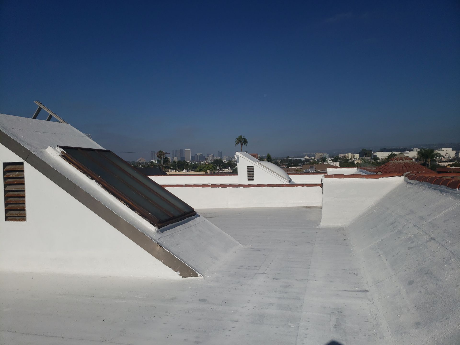 Commercial Roofing Installation using Silicone Coating by Hull Brothers Roofing