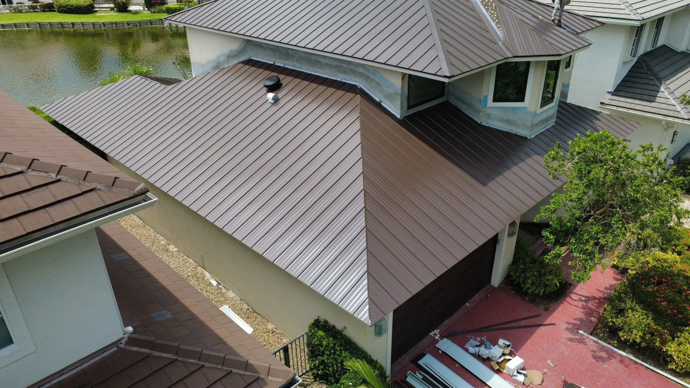 Residential Roofing Installation using 1" Nail strip metal roof by BLUES BROTHERS ROOFING
