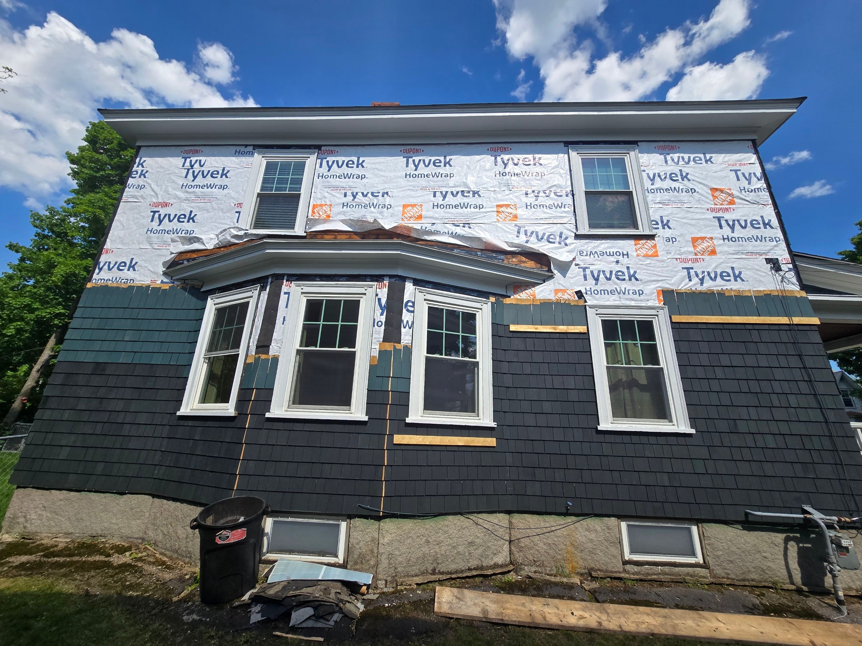 Siding replacement using cedar shakes by Freedom Handyman Services