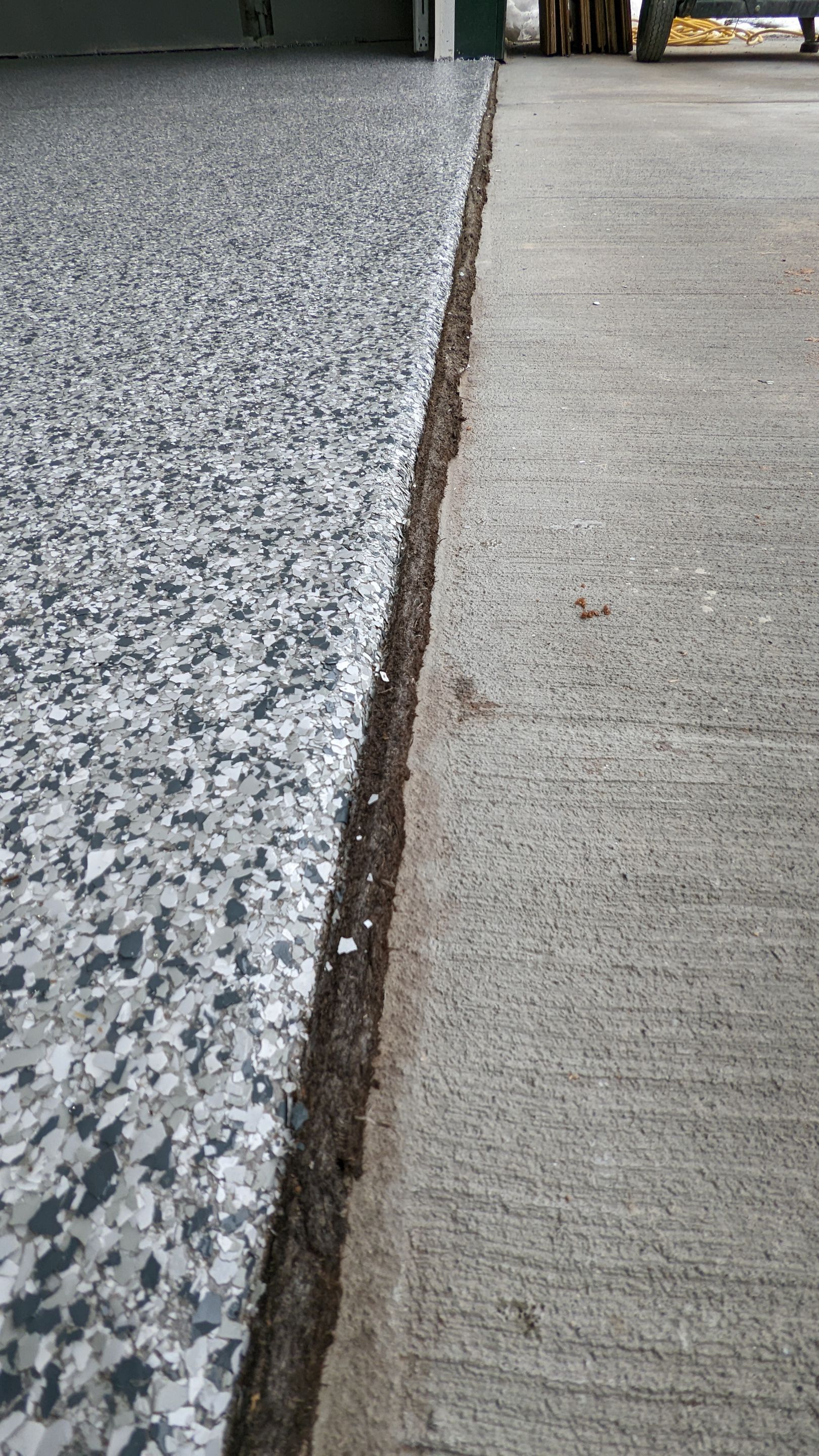 Garage Transformation using Slate Stone by Croc Coatings, LLC