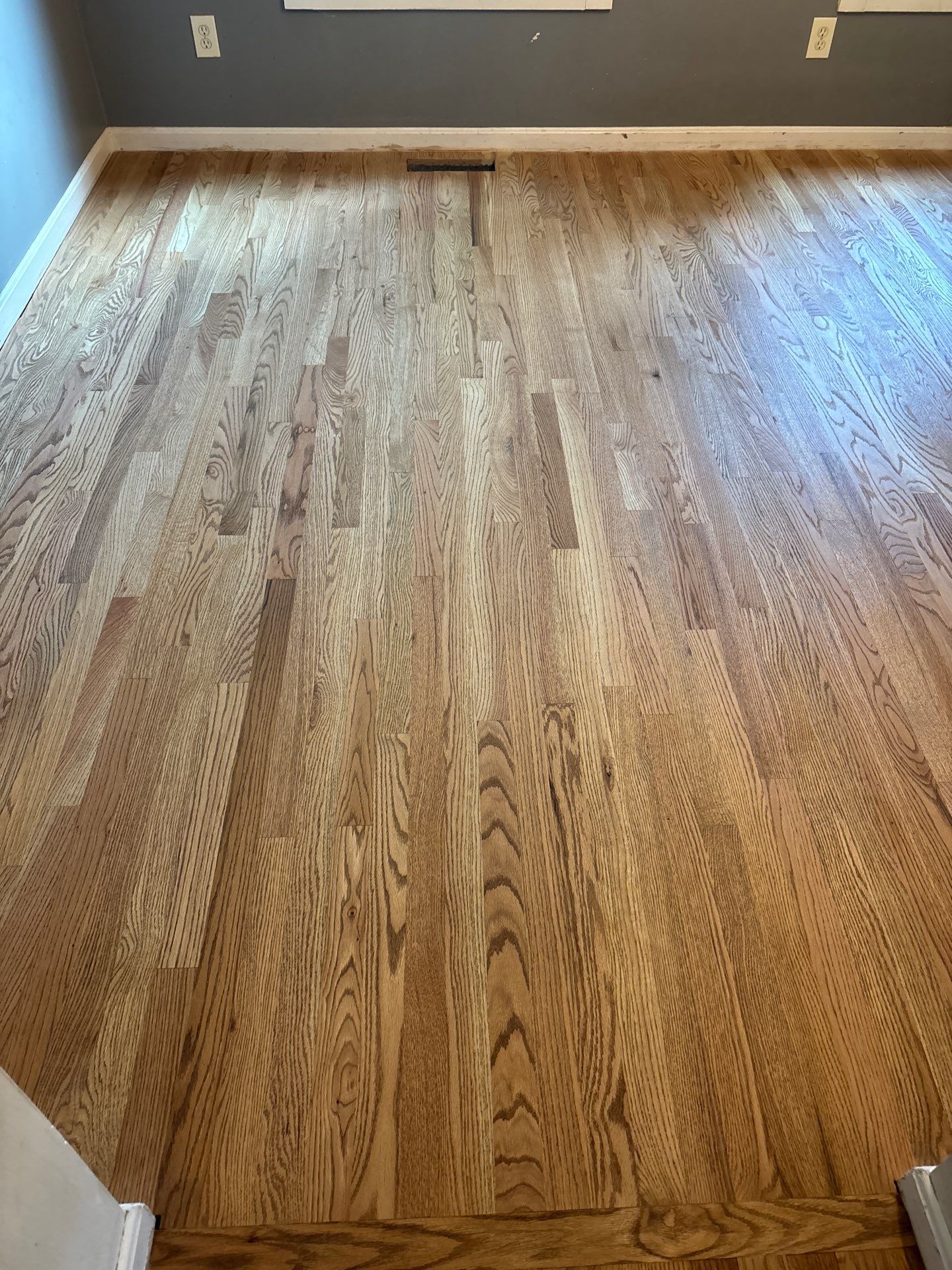 Natural Oak Hardwood Installation and Refinishing in Florence, Kentucky by Footprints Floors Kentucky