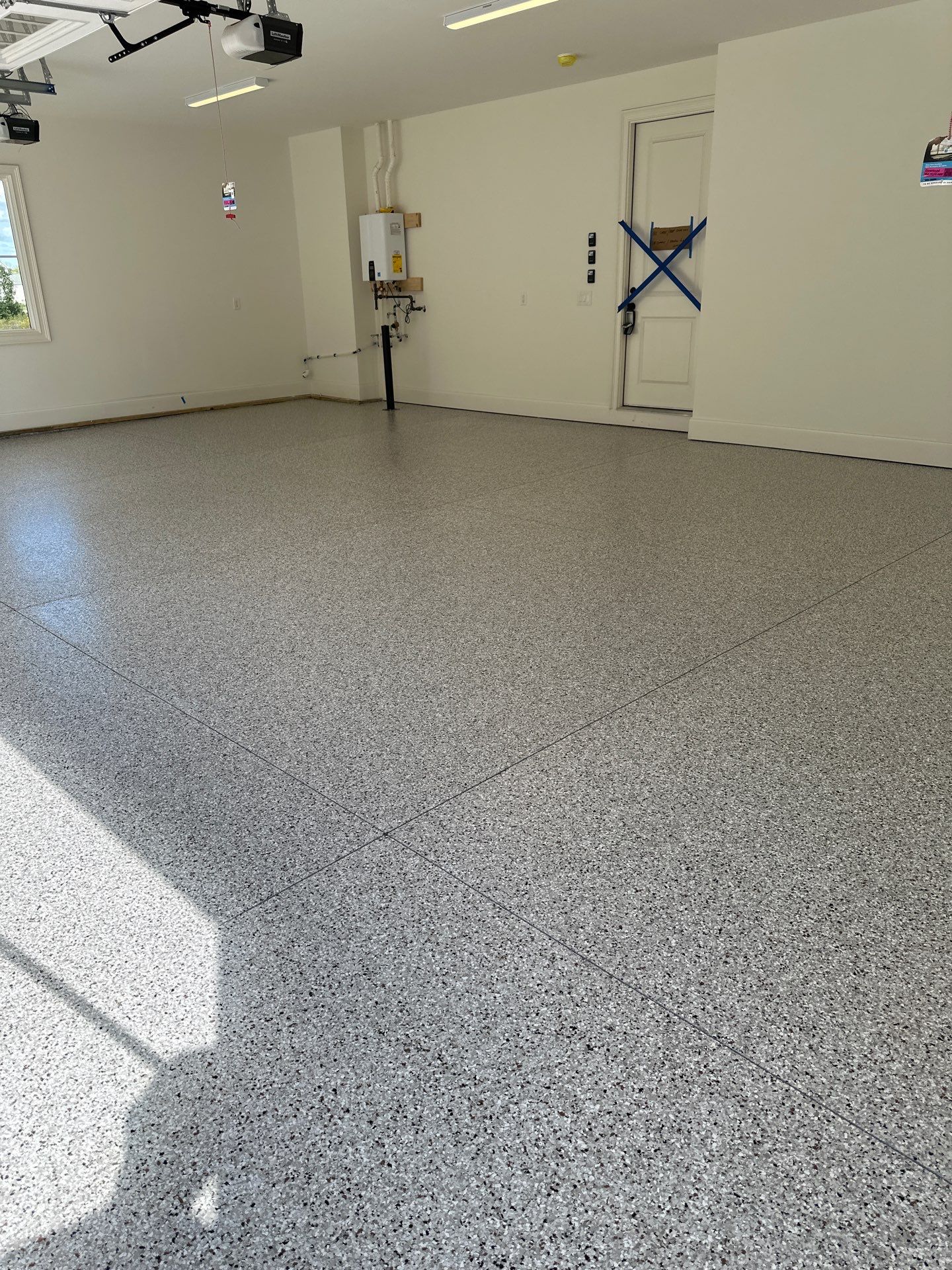 Garage Floor Coating using Coyote by My Garage Floor Guys
