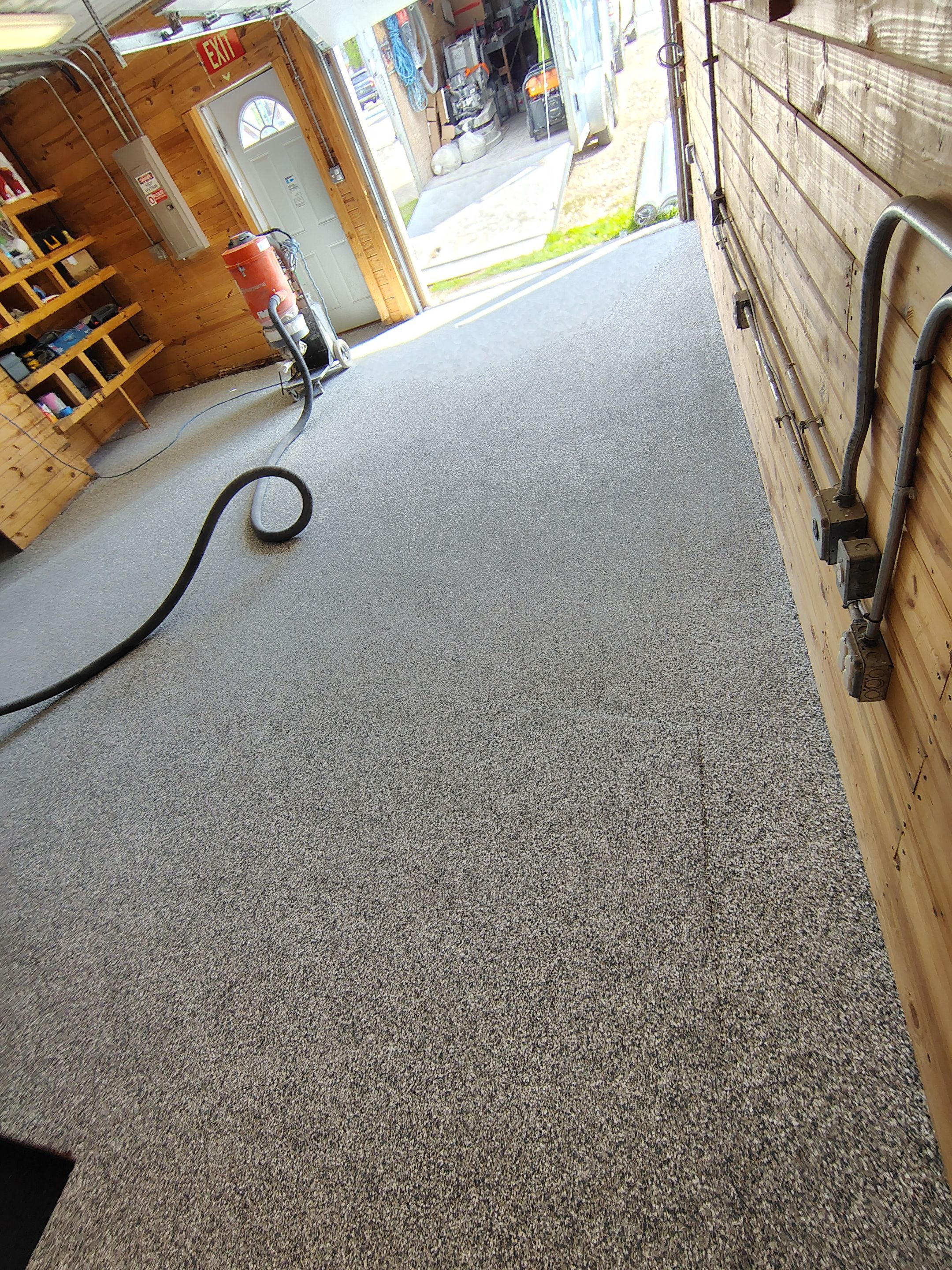Commercial Epoxy Flake Floor Coating in Emmetsburg, Iowa by Select Painting, Coatings & Garage Cabinets