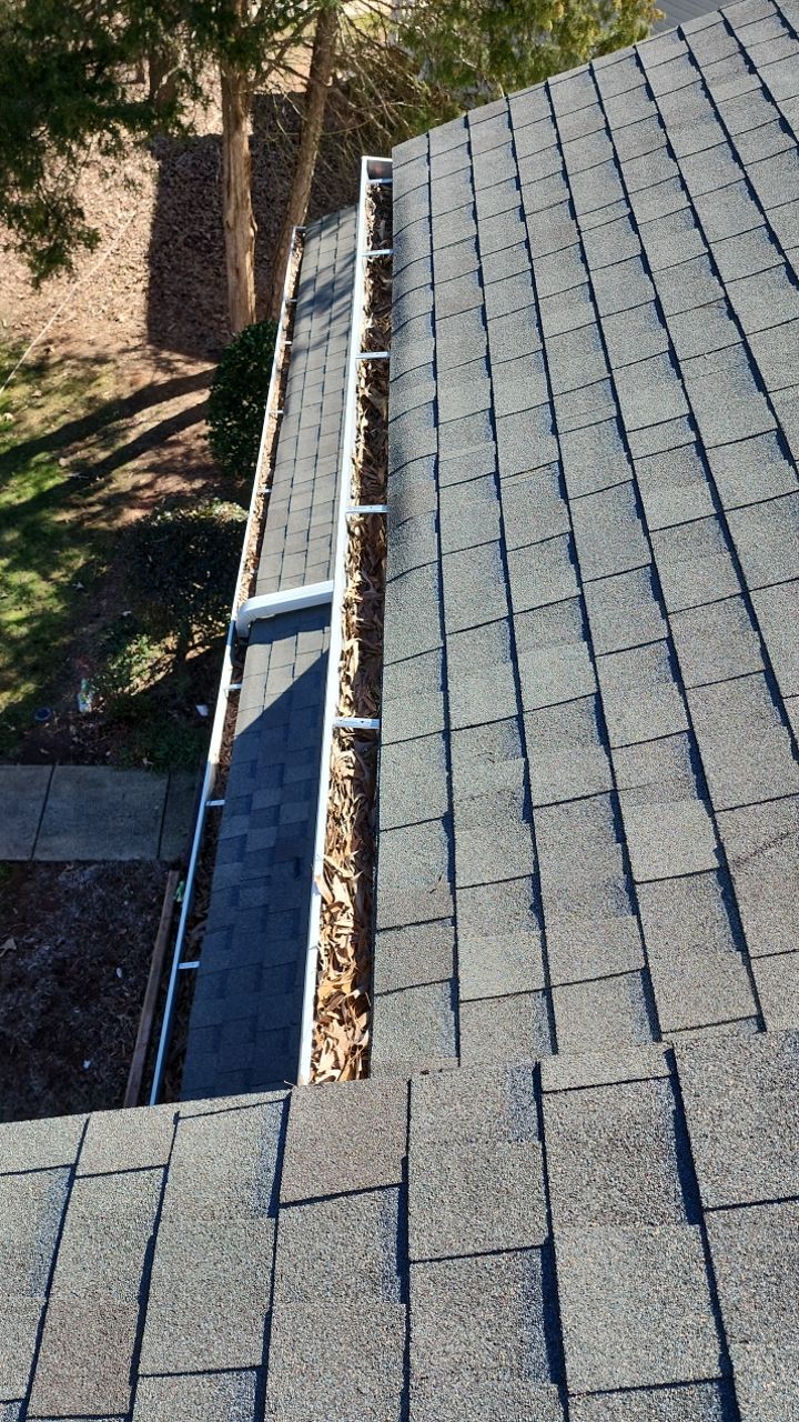 Gutter Cleaning using water by Power Wash Masters LLC