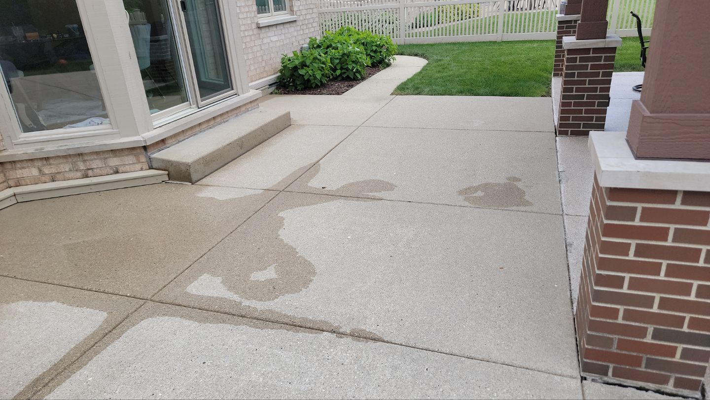 concrete power washing Algaecide, soft wash soap by Northern Power Washing LLC.
